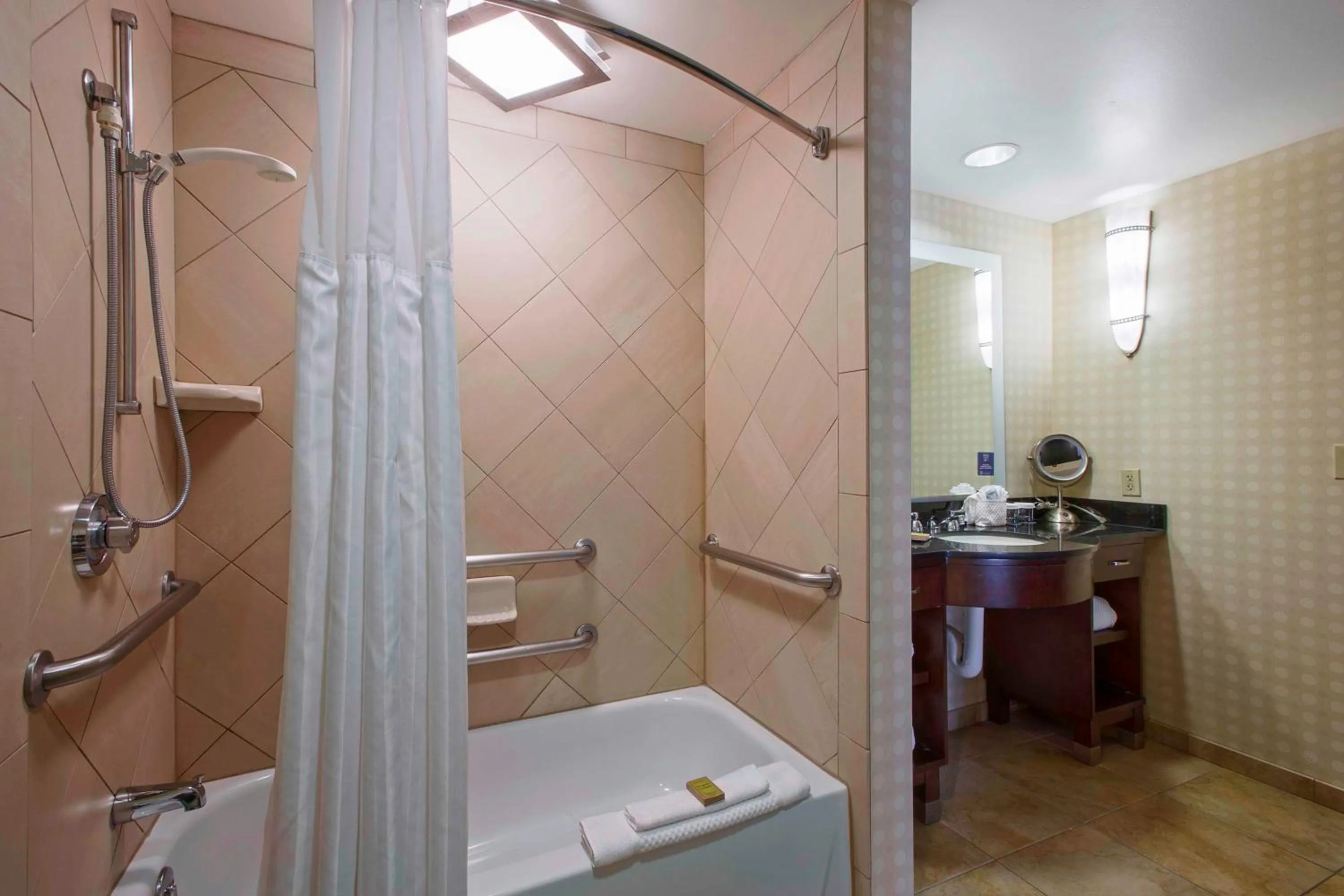 Bathroom in DoubleTree Suites by Hilton Bentonville