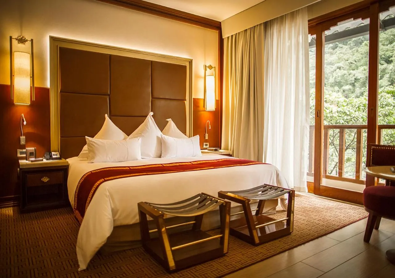 Photo of the whole room, Bed in Sumaq Machu Picchu Hotel