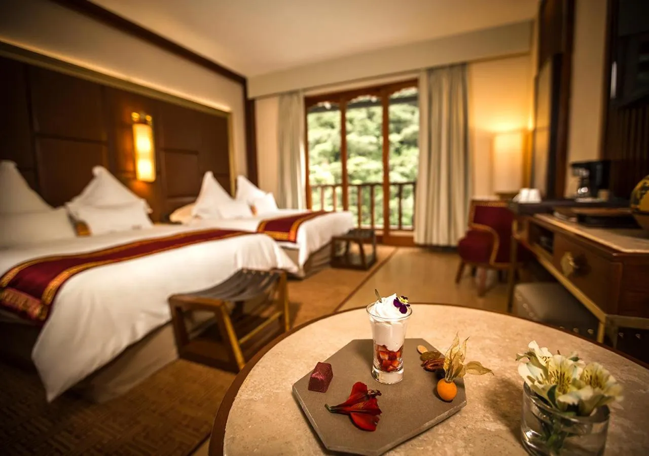 Photo of the whole room, Bed in Sumaq Machu Picchu Hotel