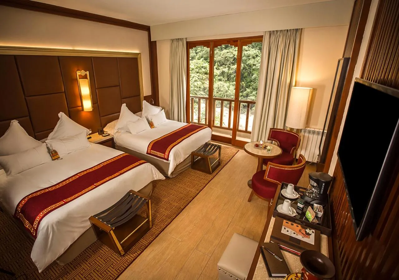 Photo of the whole room, Bed in Sumaq Machu Picchu Hotel