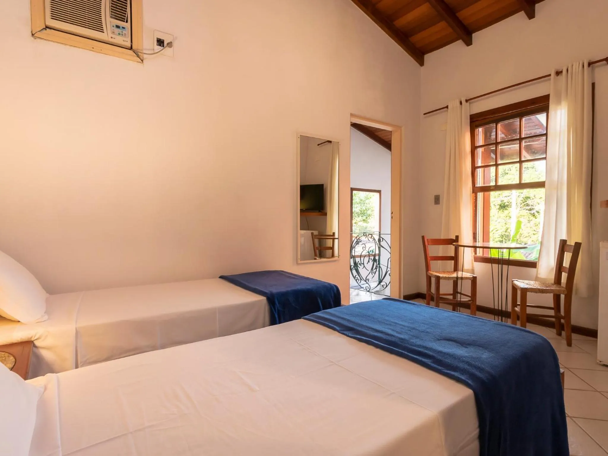 Bed in Pousada Atiaia