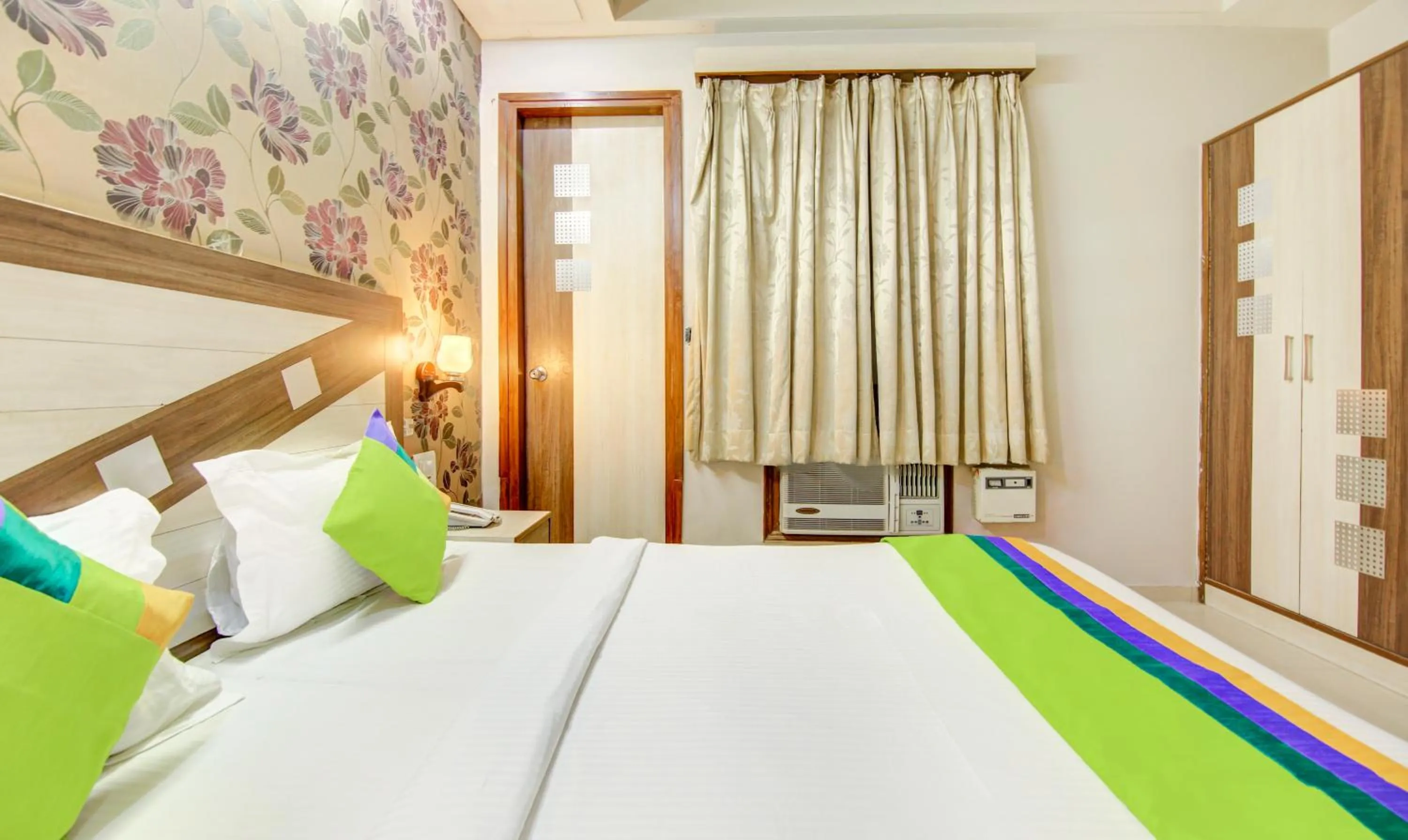 Bedroom, Bed in Treebo Rockwell Plaza