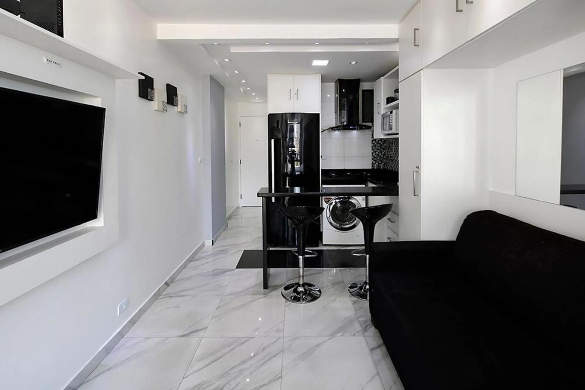 Studio moderno com vista privilegiada para a praia