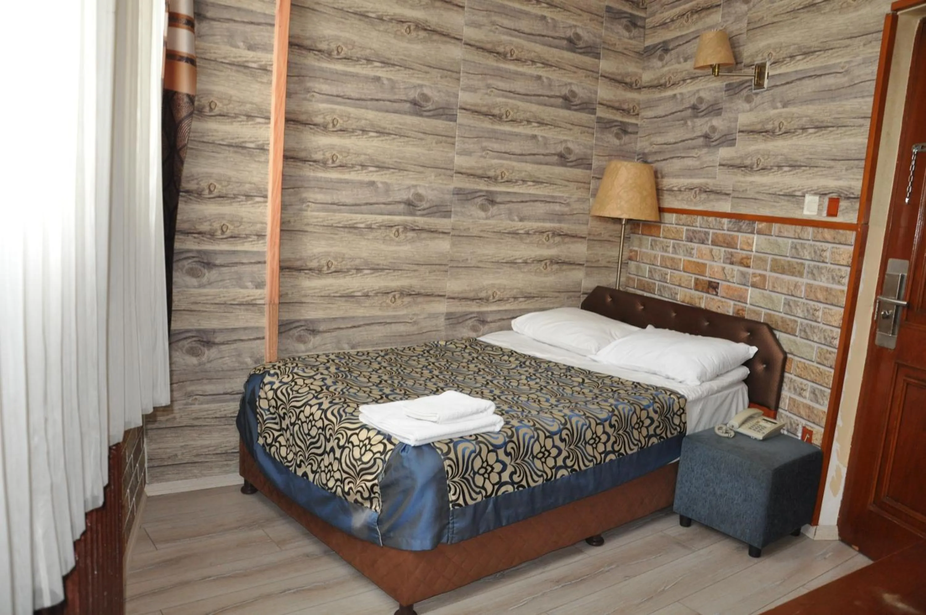 Bed in Hotel Red Rose