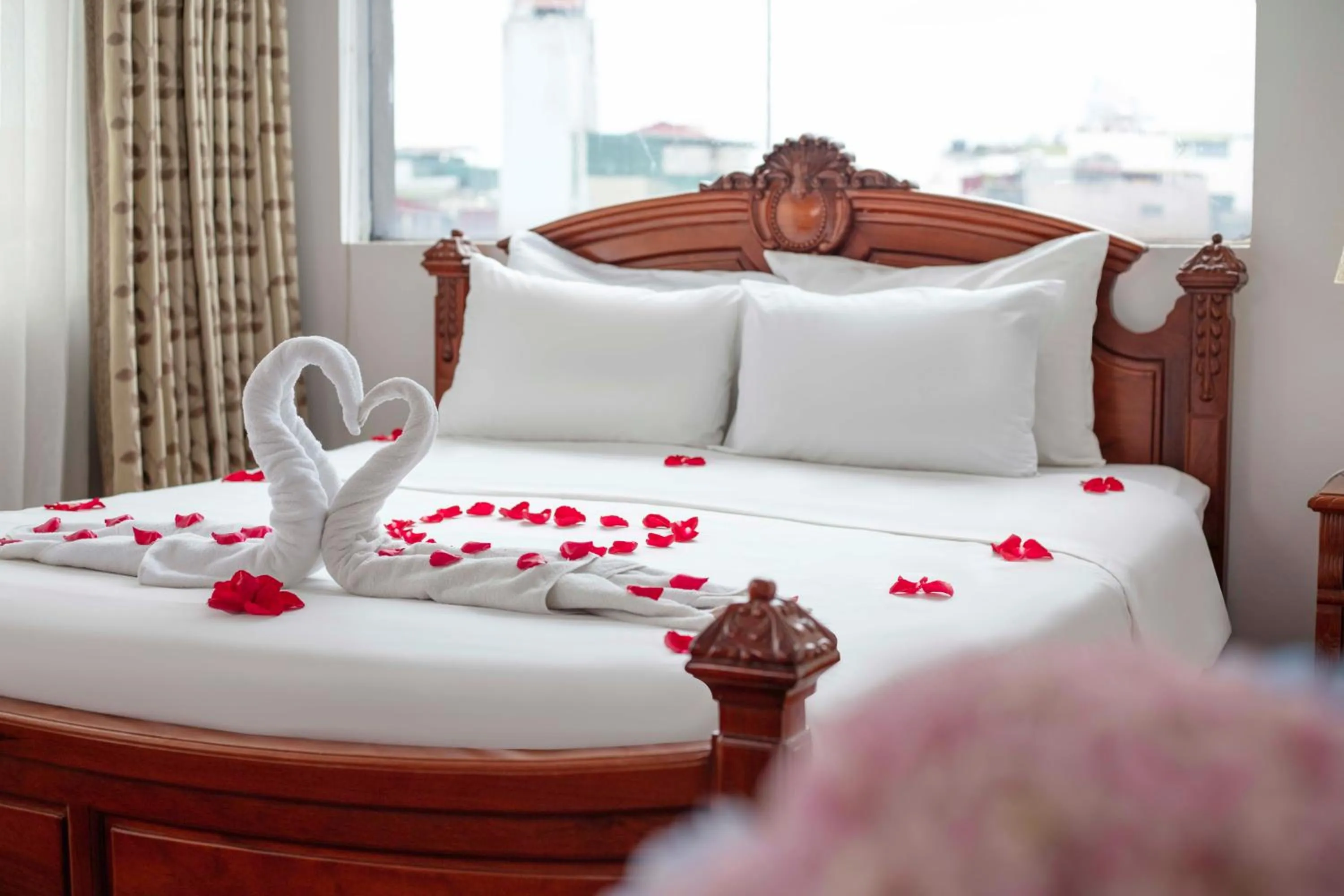 Bed in Phoenix Palace Hotel Hanoi