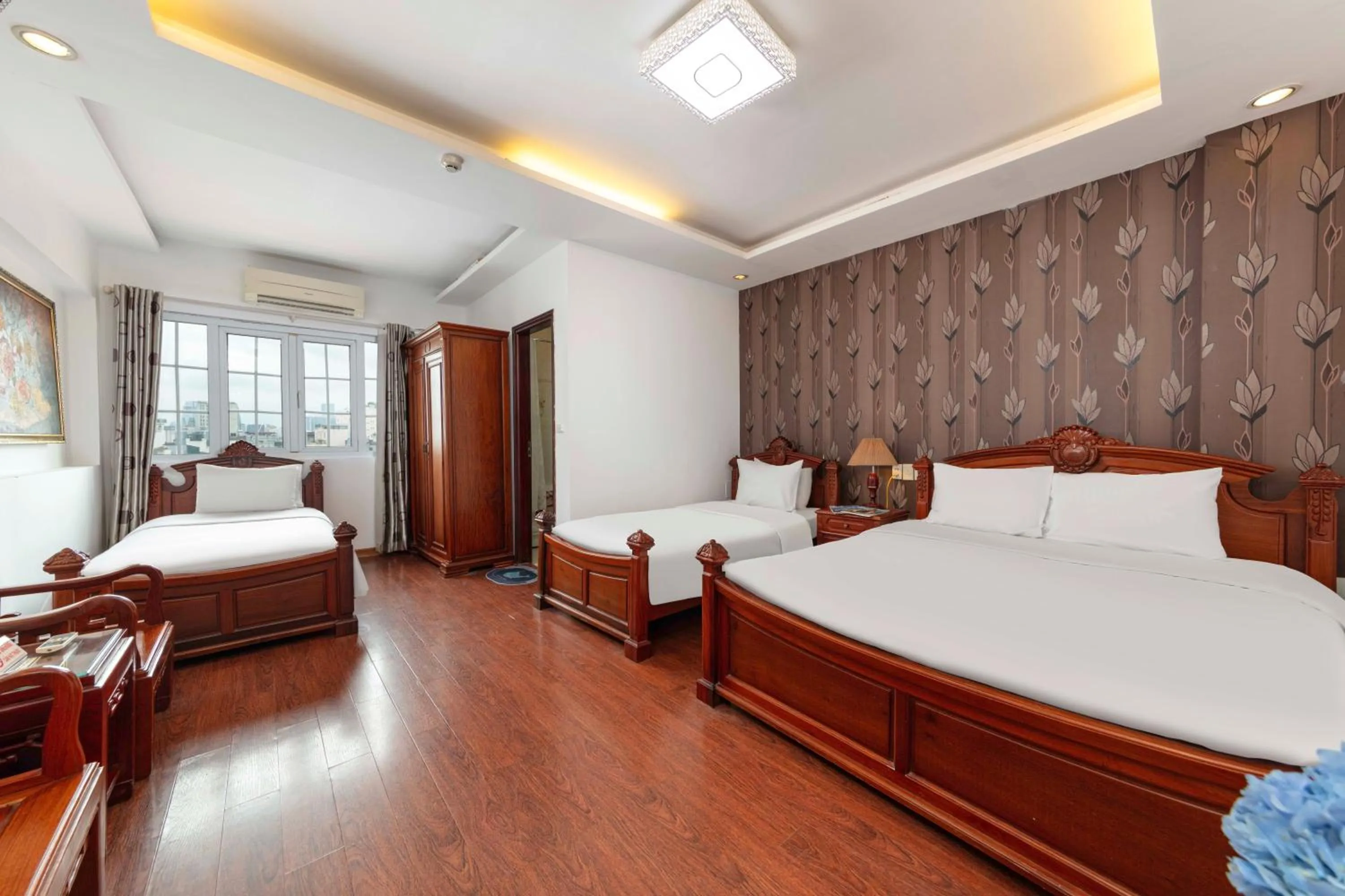 Bed in Phoenix Palace Hotel Hanoi