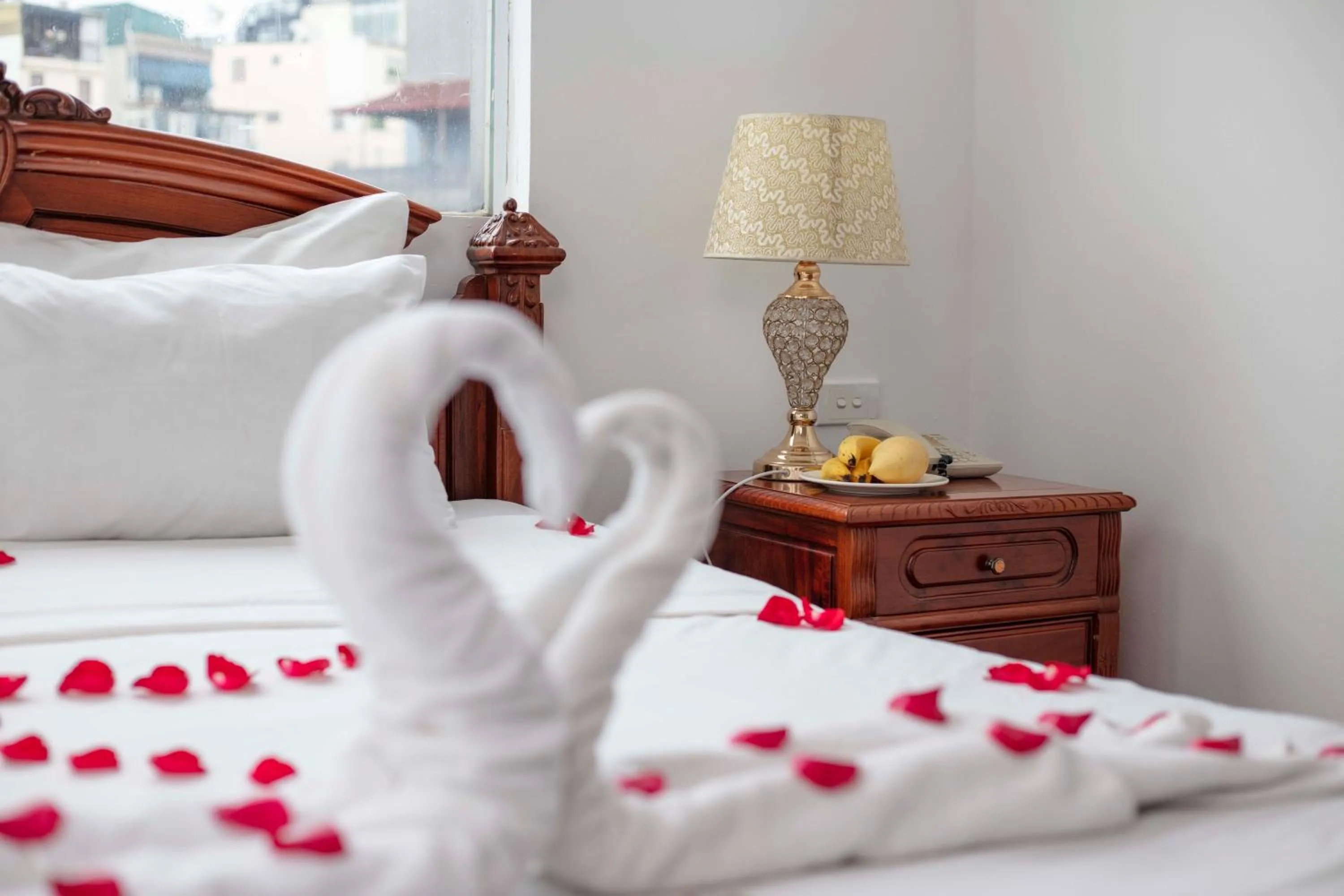 Bed in Phoenix Palace Hotel Hanoi