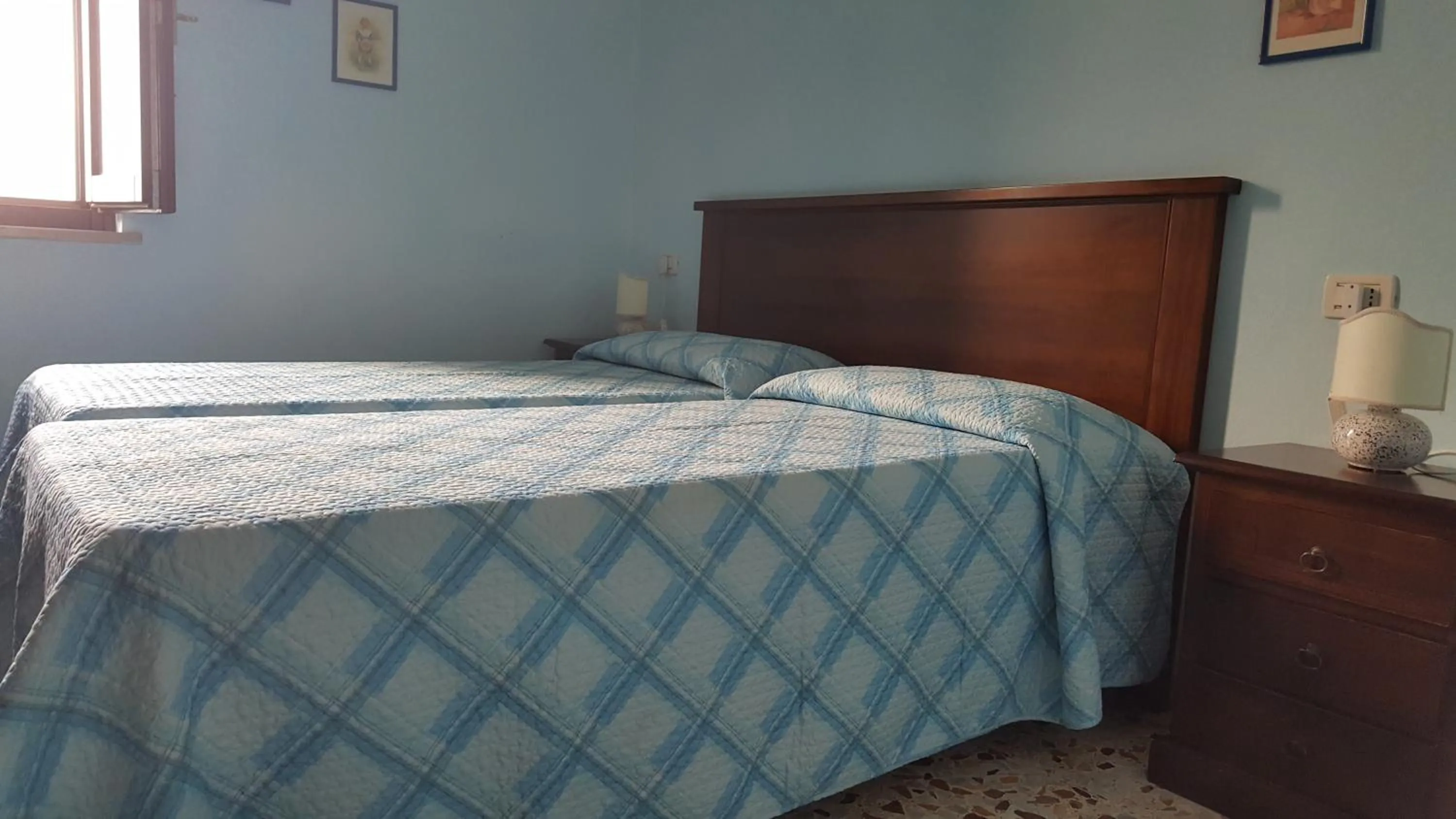 Bedroom in Locanda B&B Momo