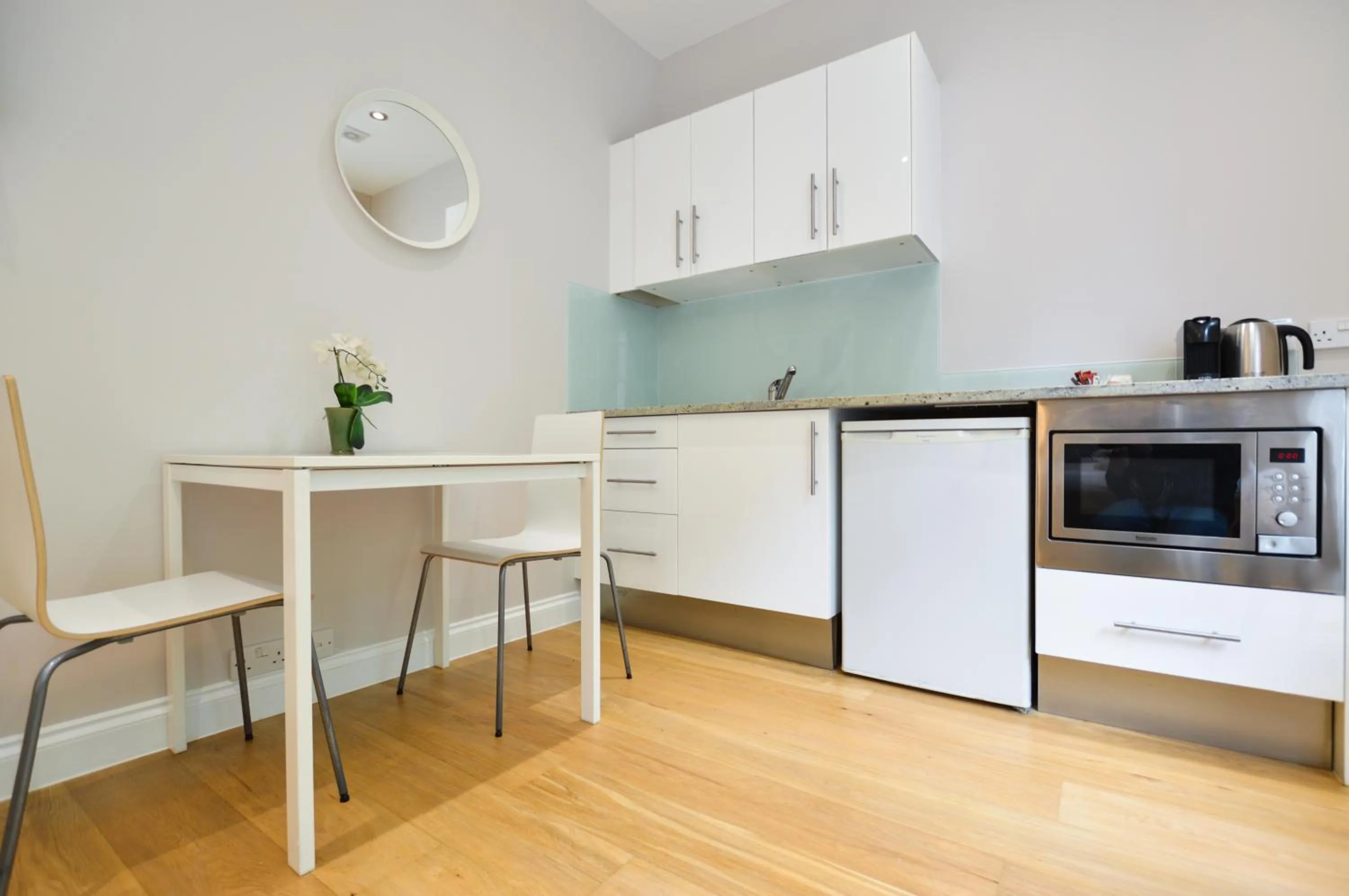 Kitchen or kitchenette in Paddington Green Serviced Apartments by Concept Apartments