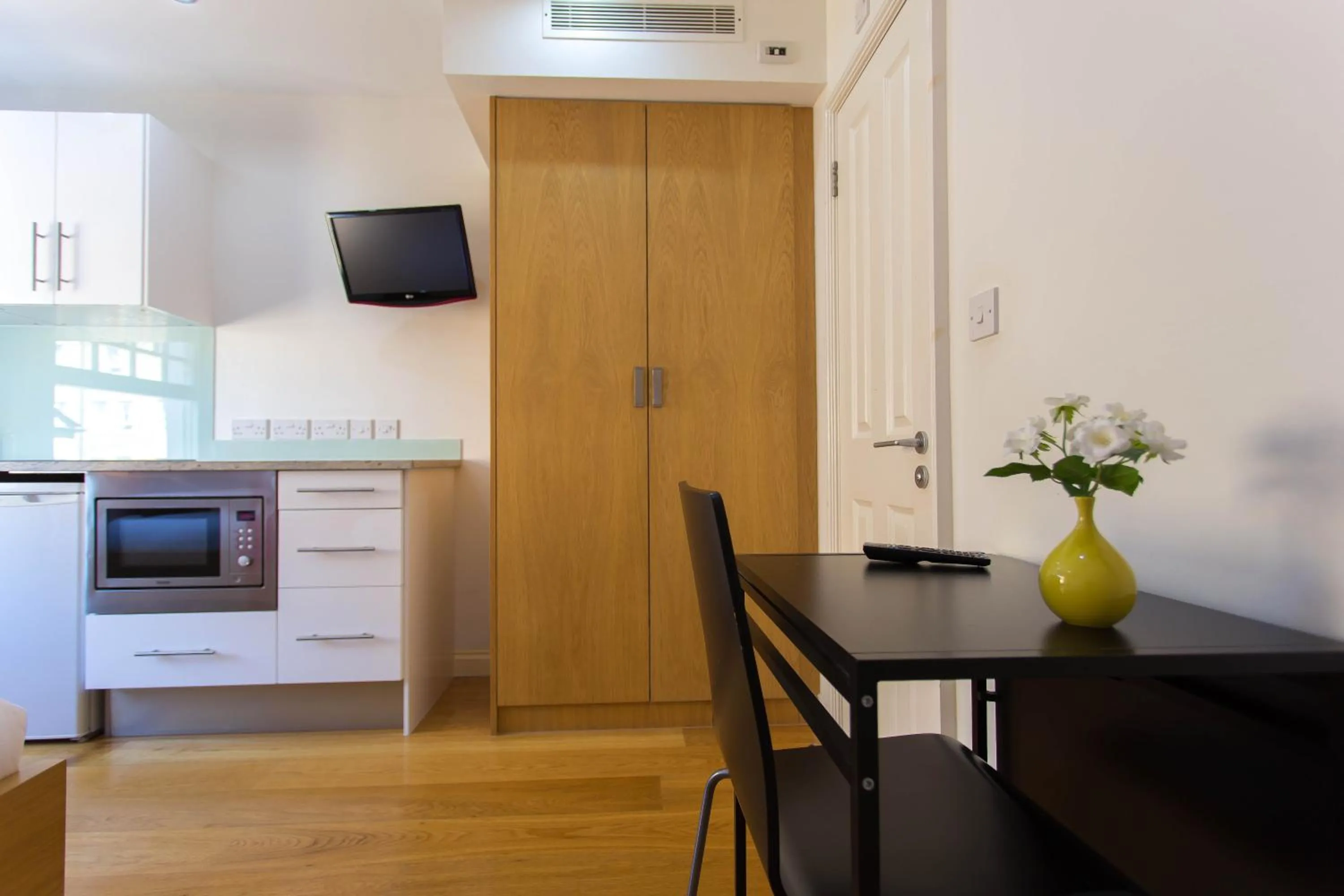 Kitchen or kitchenette in Paddington Green Serviced Apartments by Concept Apartments