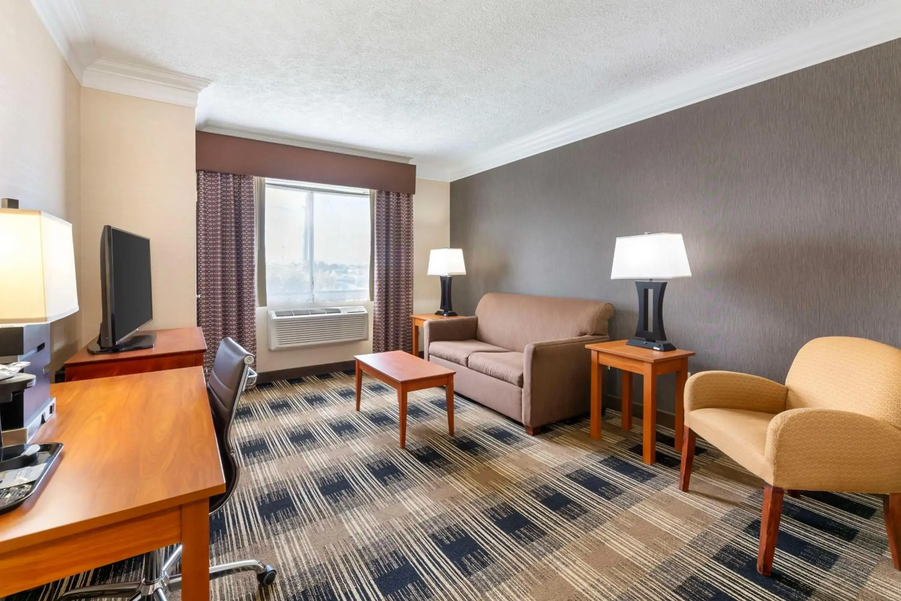 King Suite with Sofa Bed and Separate Sitting Area - Non-Smoking in Best Western Inn at the Rochester Airport King Suite with Sofa Bed and Separate Sitting Area - Non-Smoking in Best Western Inn at the Rochester Airport