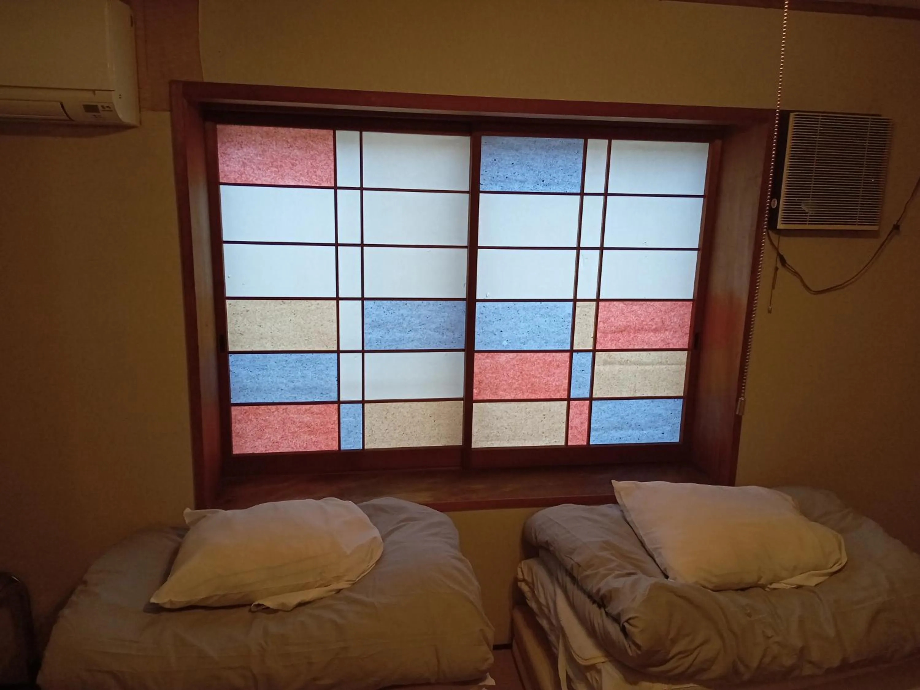 Bed in 民宿有田 Arita Guesthouse