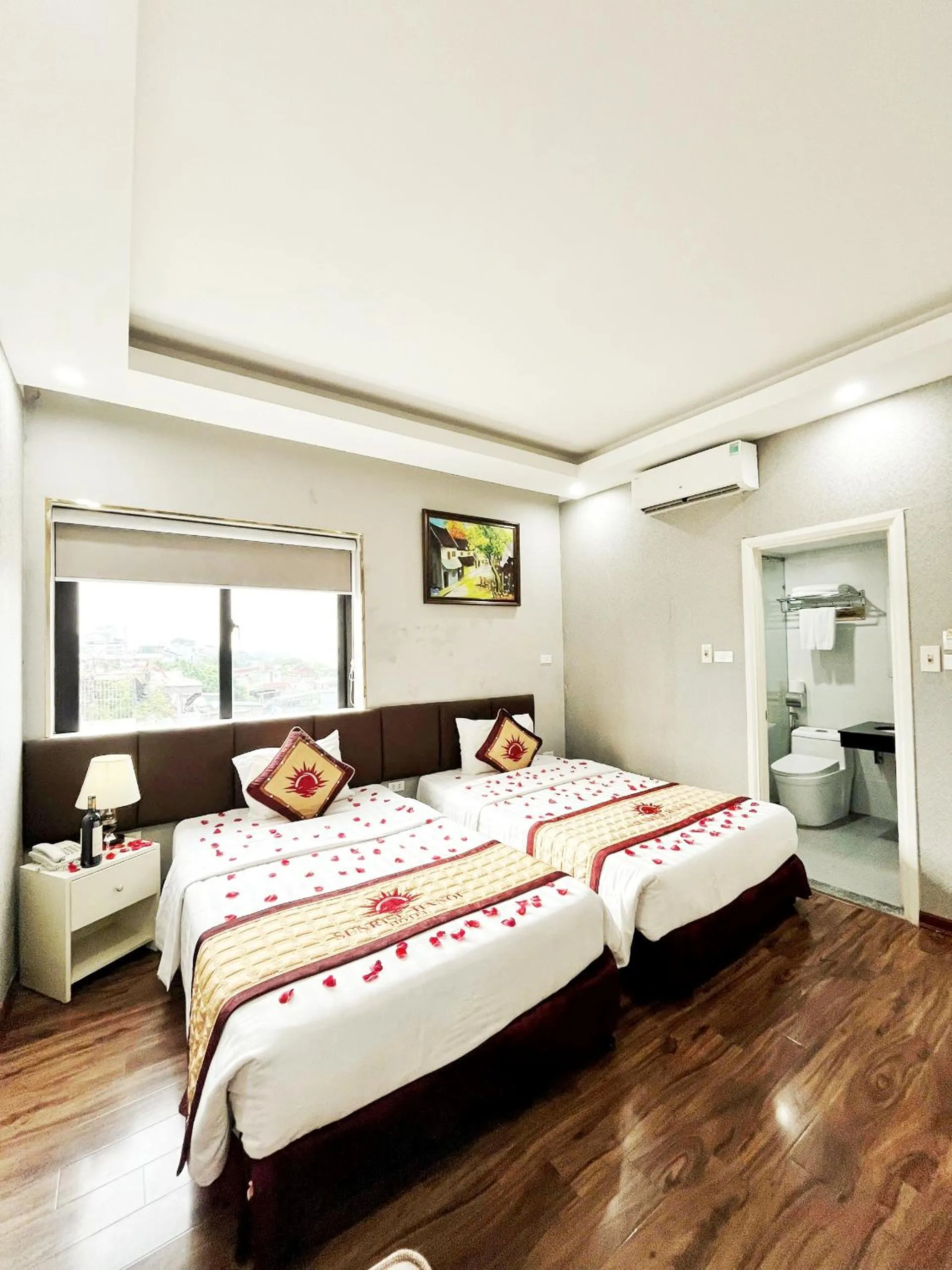 Bed in Sunrise Hanoi Hotel