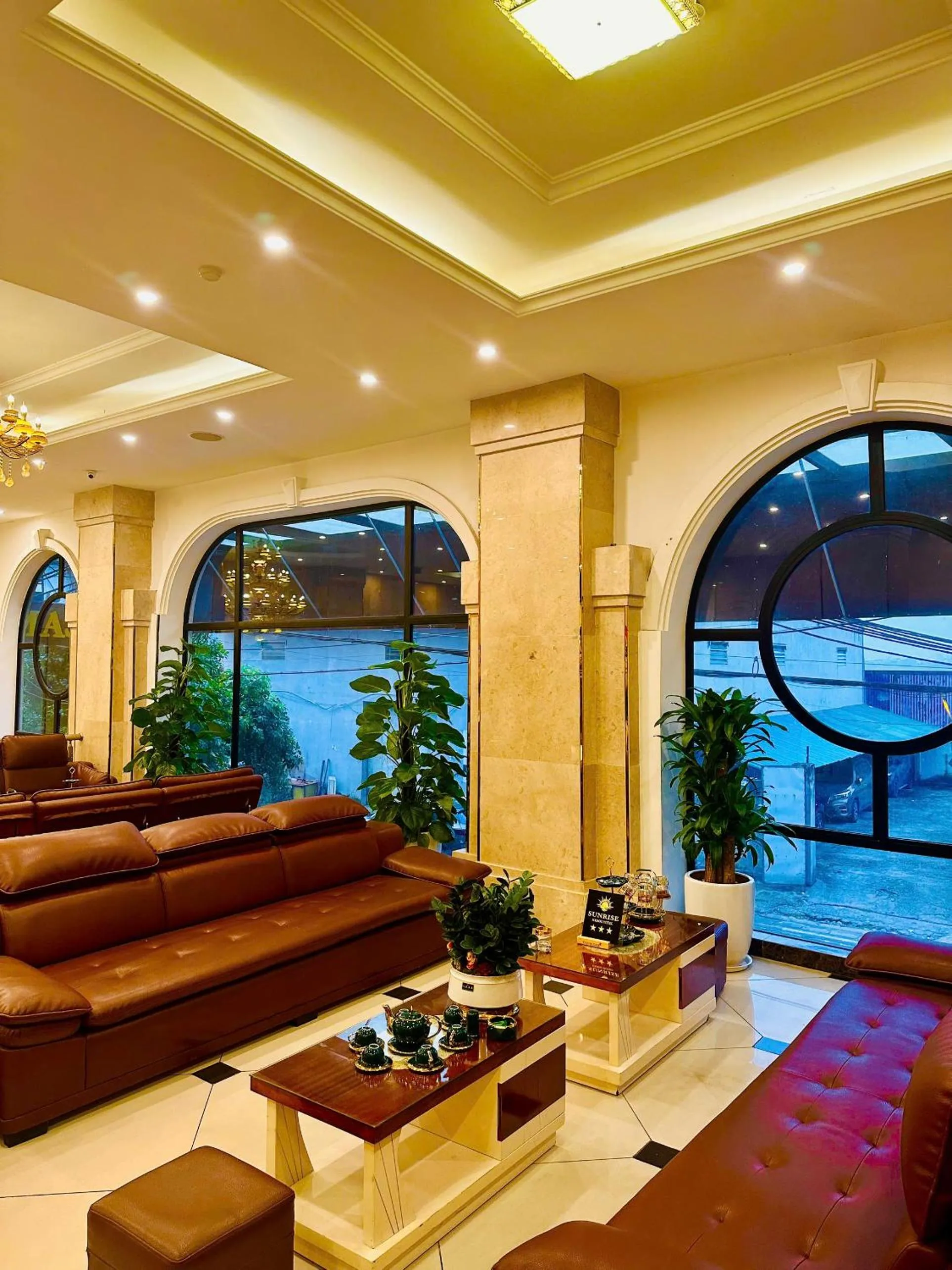 Communal lounge/ TV room in Sunrise Hanoi Hotel