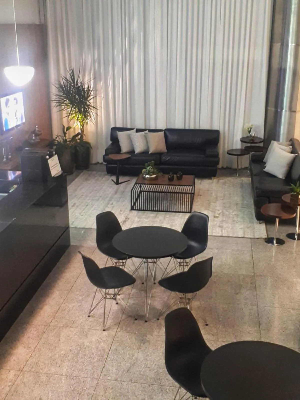 Lobby or reception in San Diego Suítes Lourdes - OFICIAL