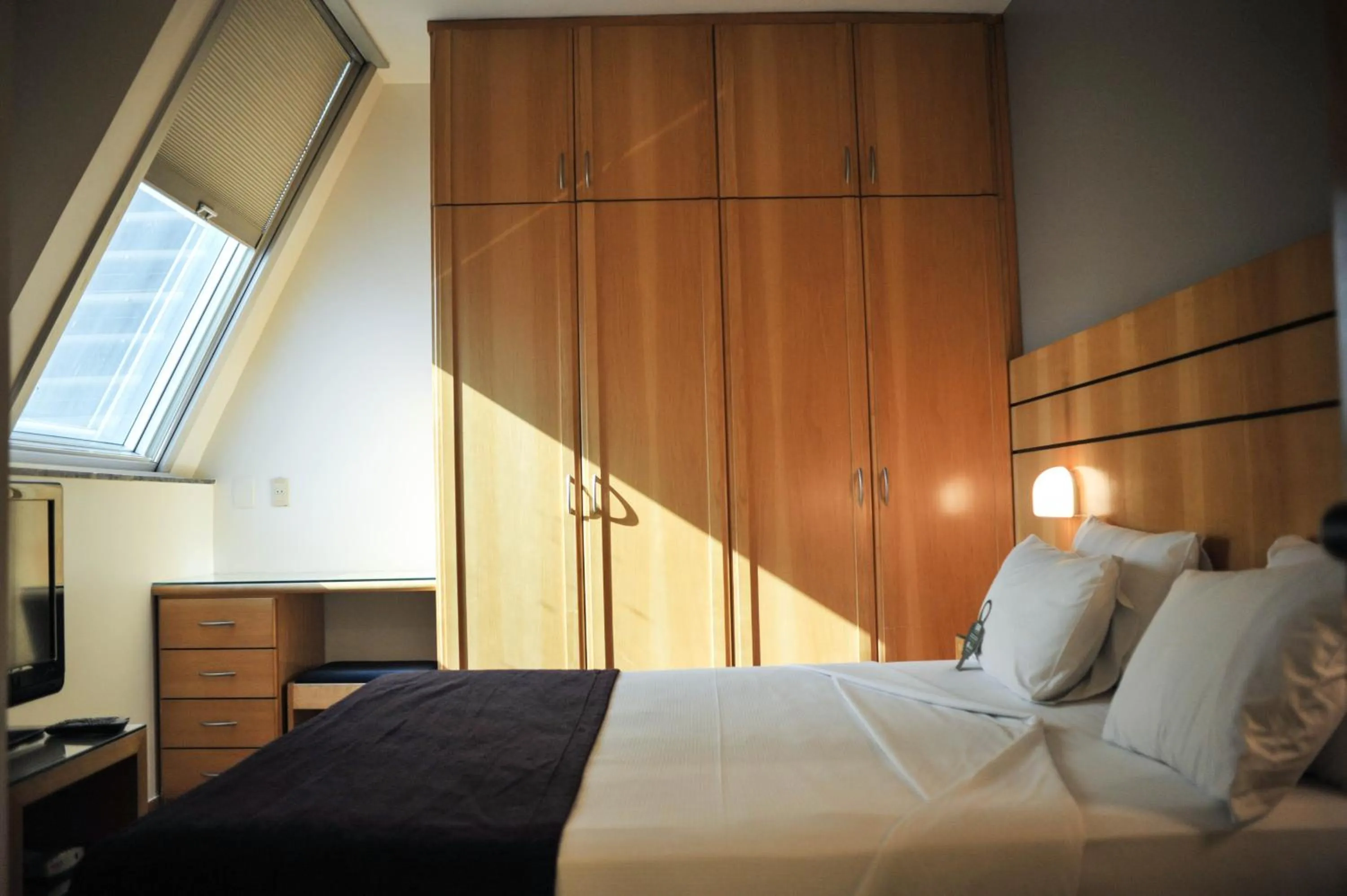 Bedroom, Bed in San Diego Suítes Lourdes - OFICIAL