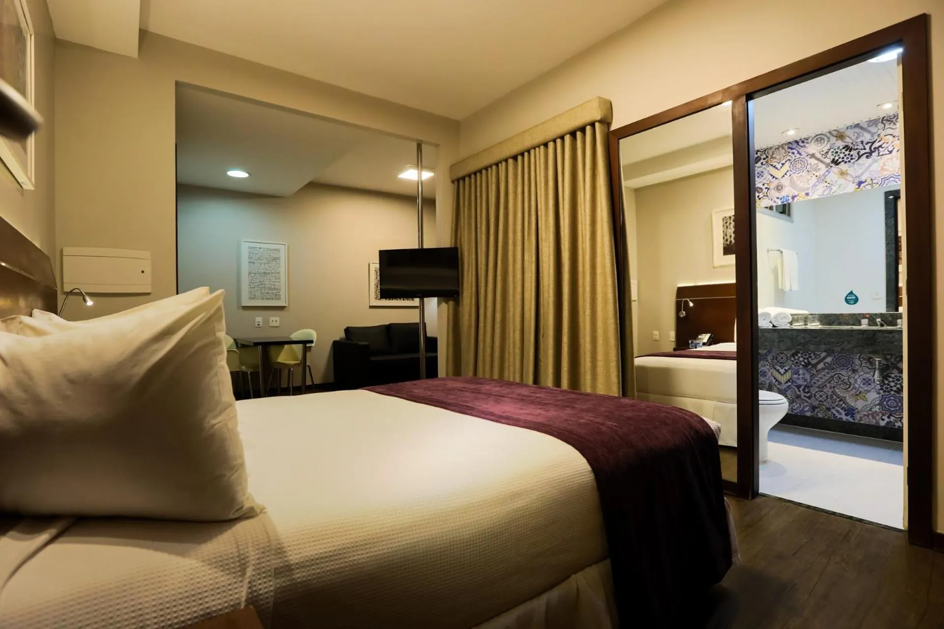 Bed in San Diego Suites Ipatinga