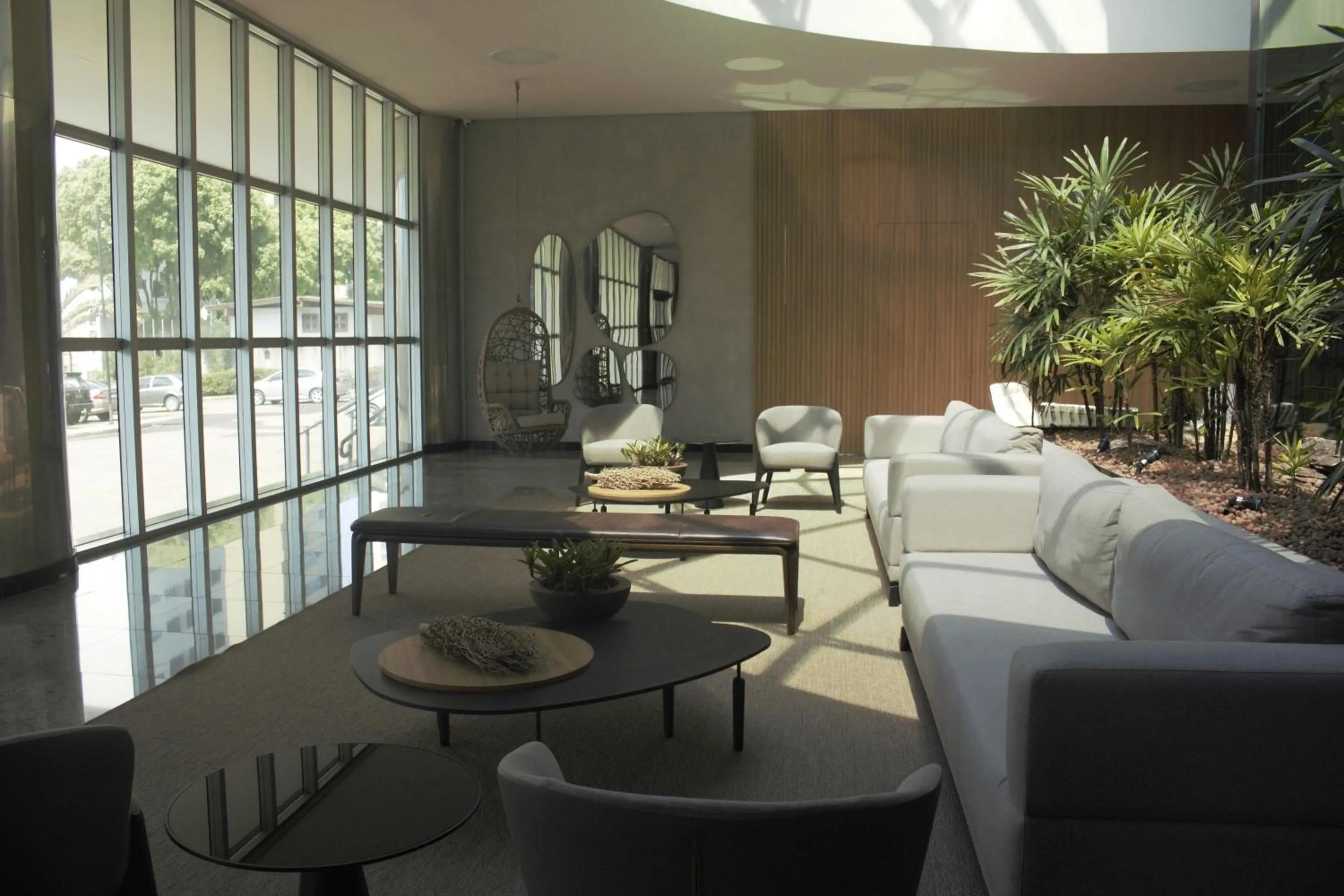 Seating area in San Diego Suites Ipatinga