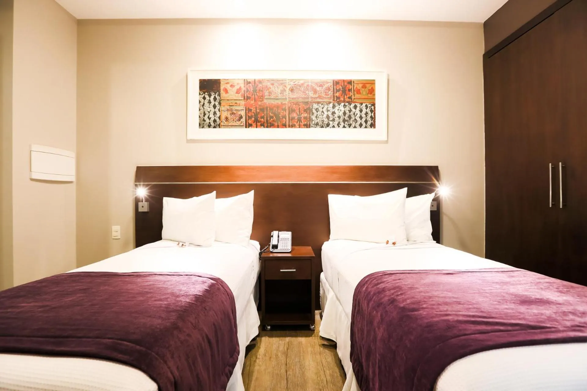 Bed in San Diego Suites Ipatinga