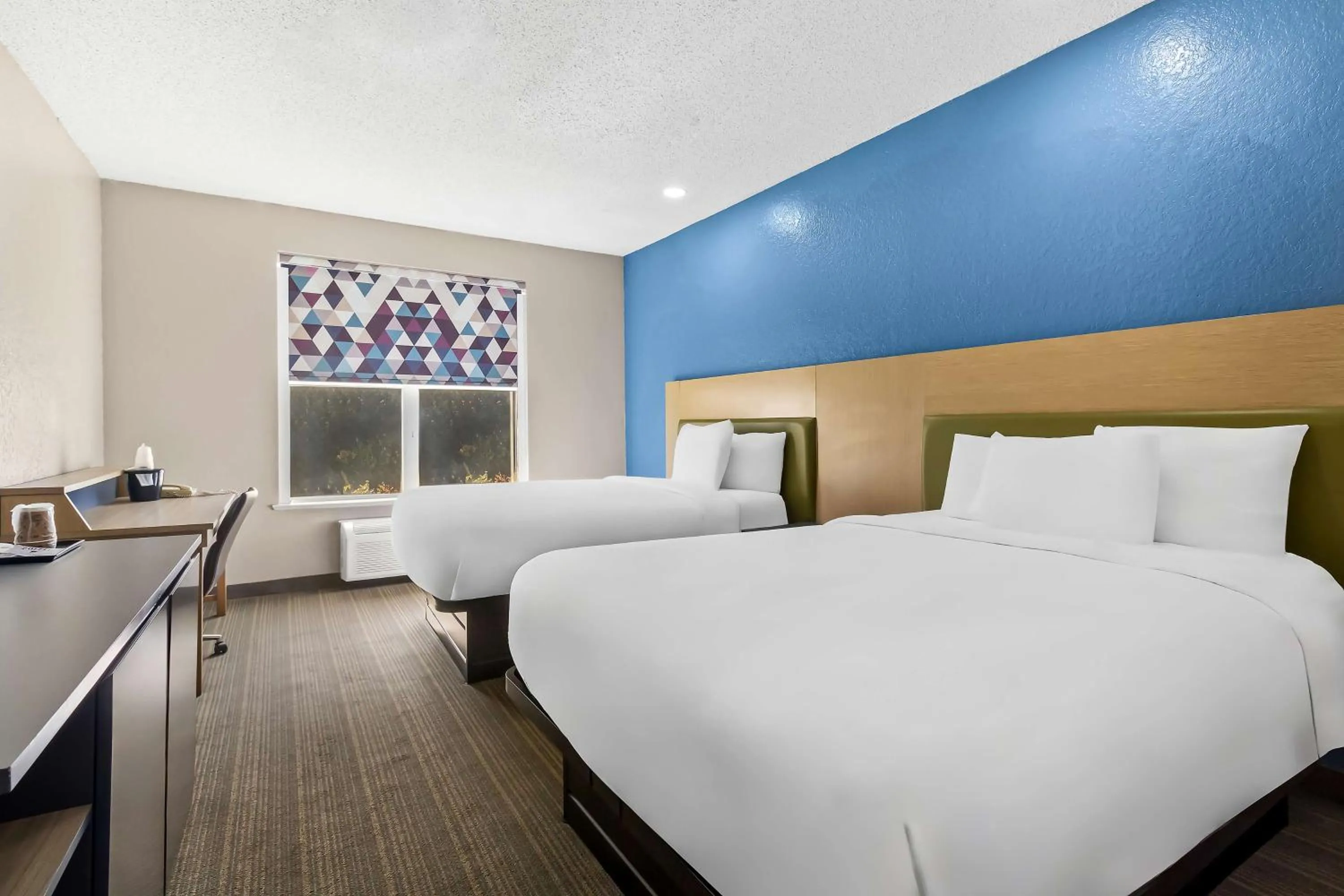 Bedroom, Bed in Sonesta Essential IAH Airport JFK Boulevard - Newly Renovated