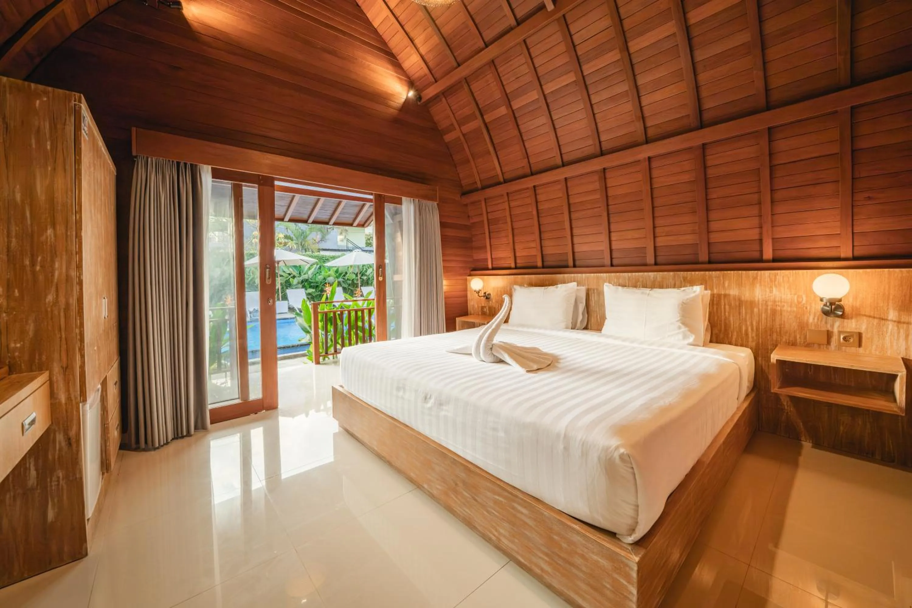 Bed in Uma Mani Villa Jimbaran