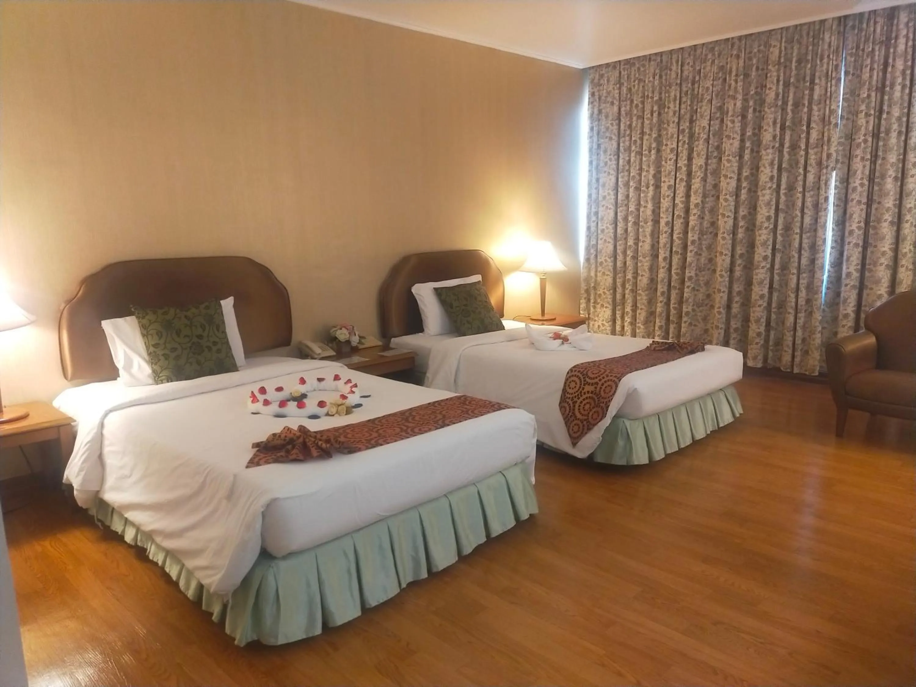 Bed in Thumrin Thana Hotel