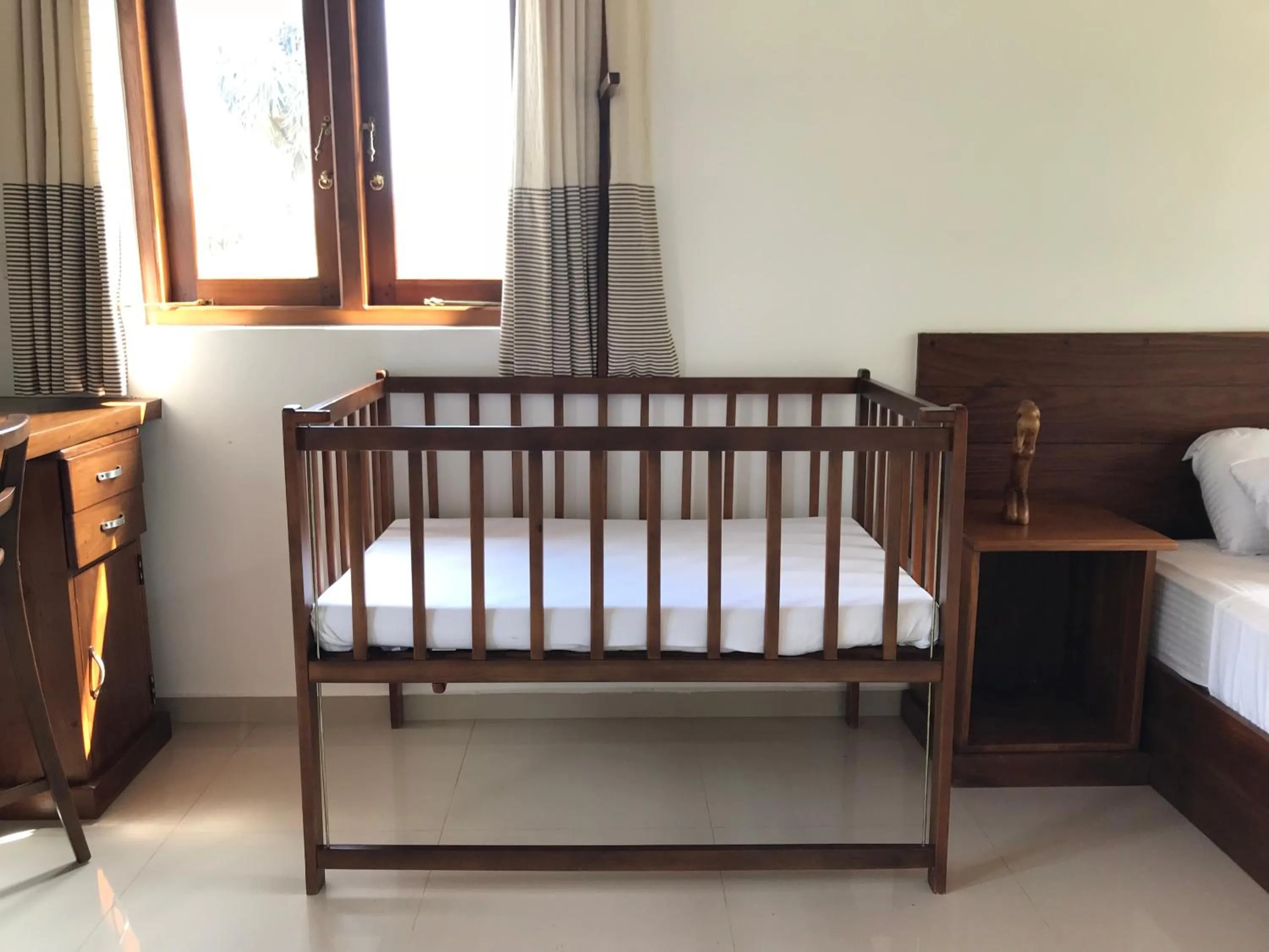 cot, Bed in Aki Villa