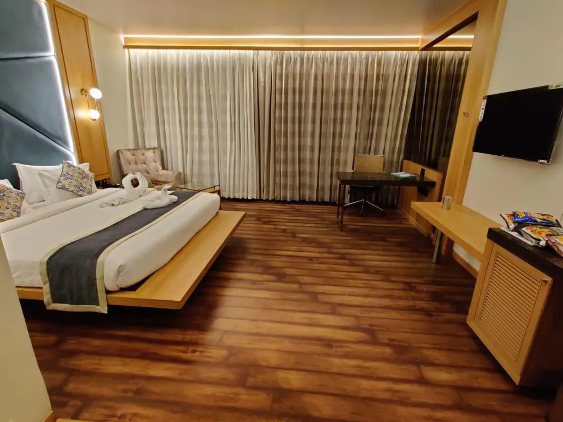 Bed in Krishna Palace Hotel