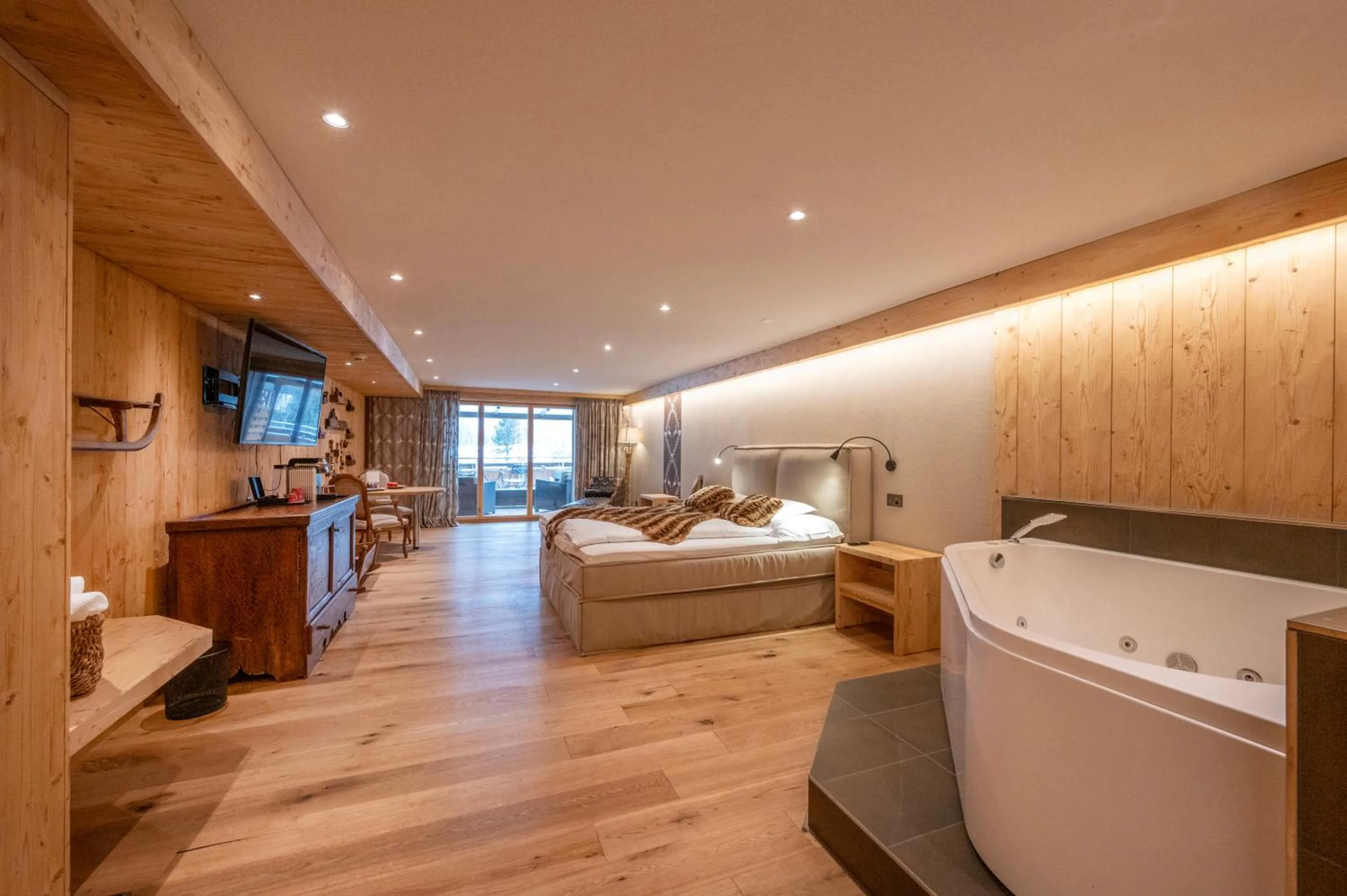 Photo of the whole room, Bed in Waldhotel Doldenhorn