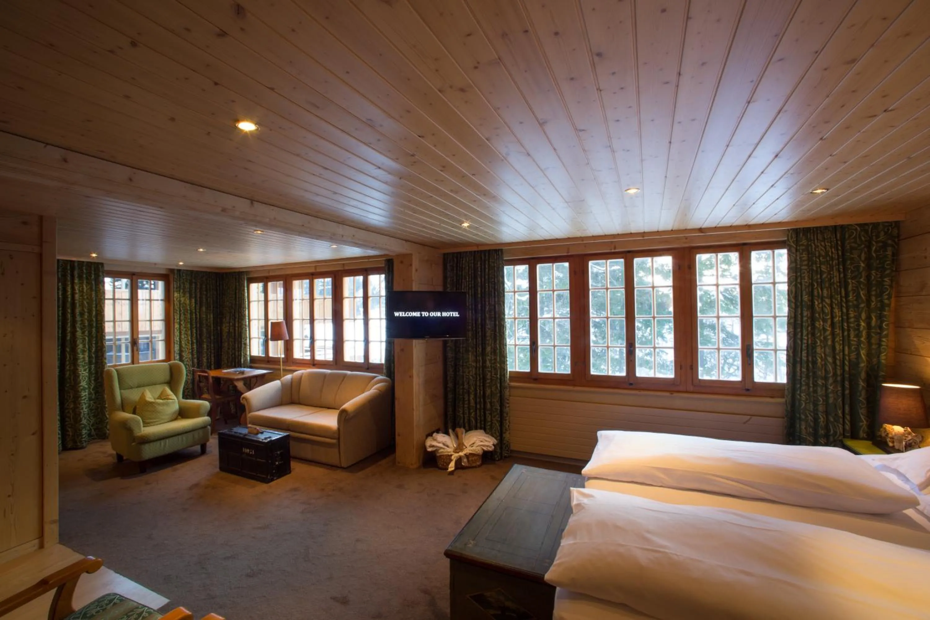 Photo of the whole room, Bed in Waldhotel Doldenhorn