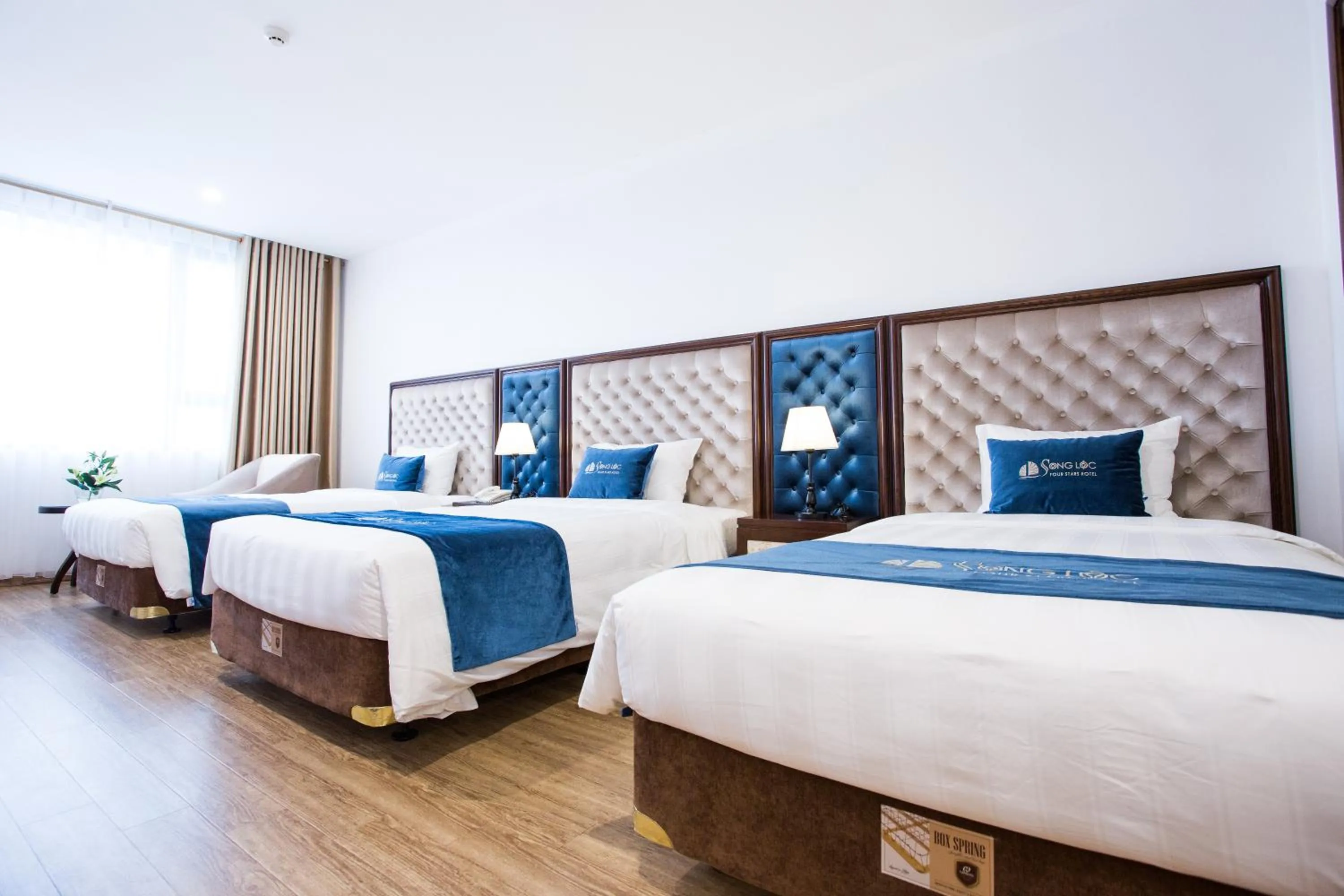 Bed in Song Loc Luxury Hotel