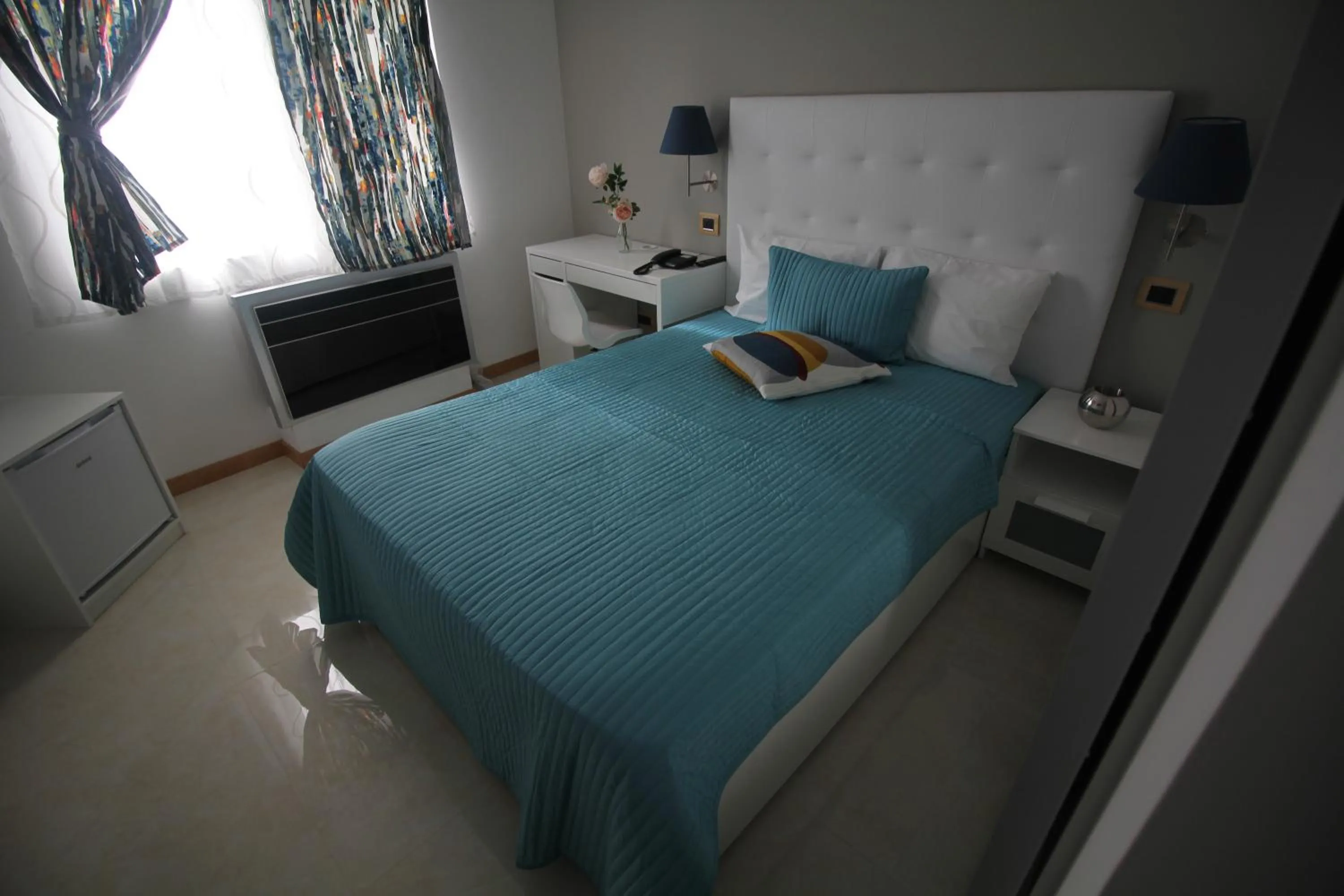 Bedroom in Morenos Boutique Hotel