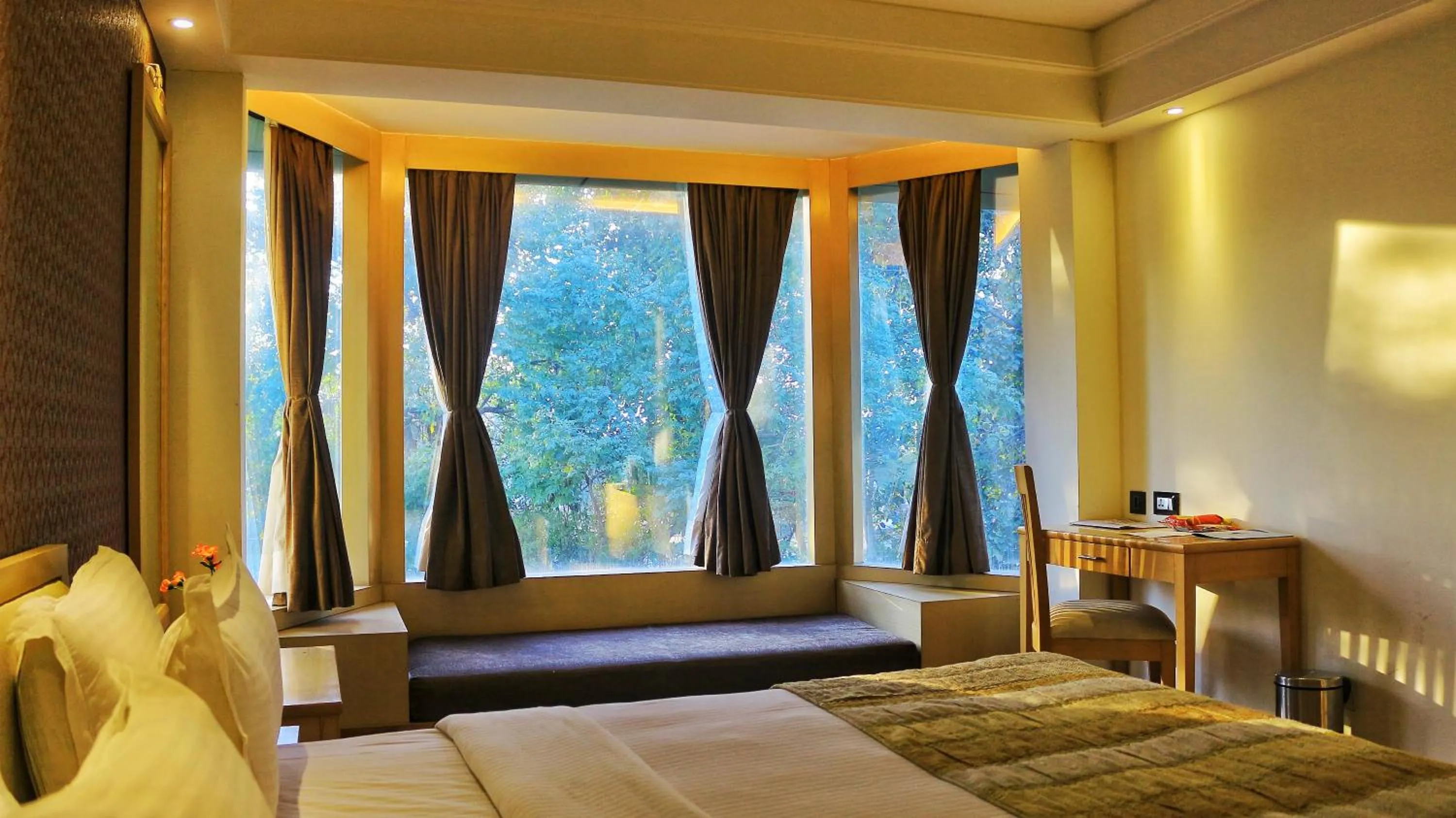 Bedroom in Dee Marks Airport Hotel & Resorts