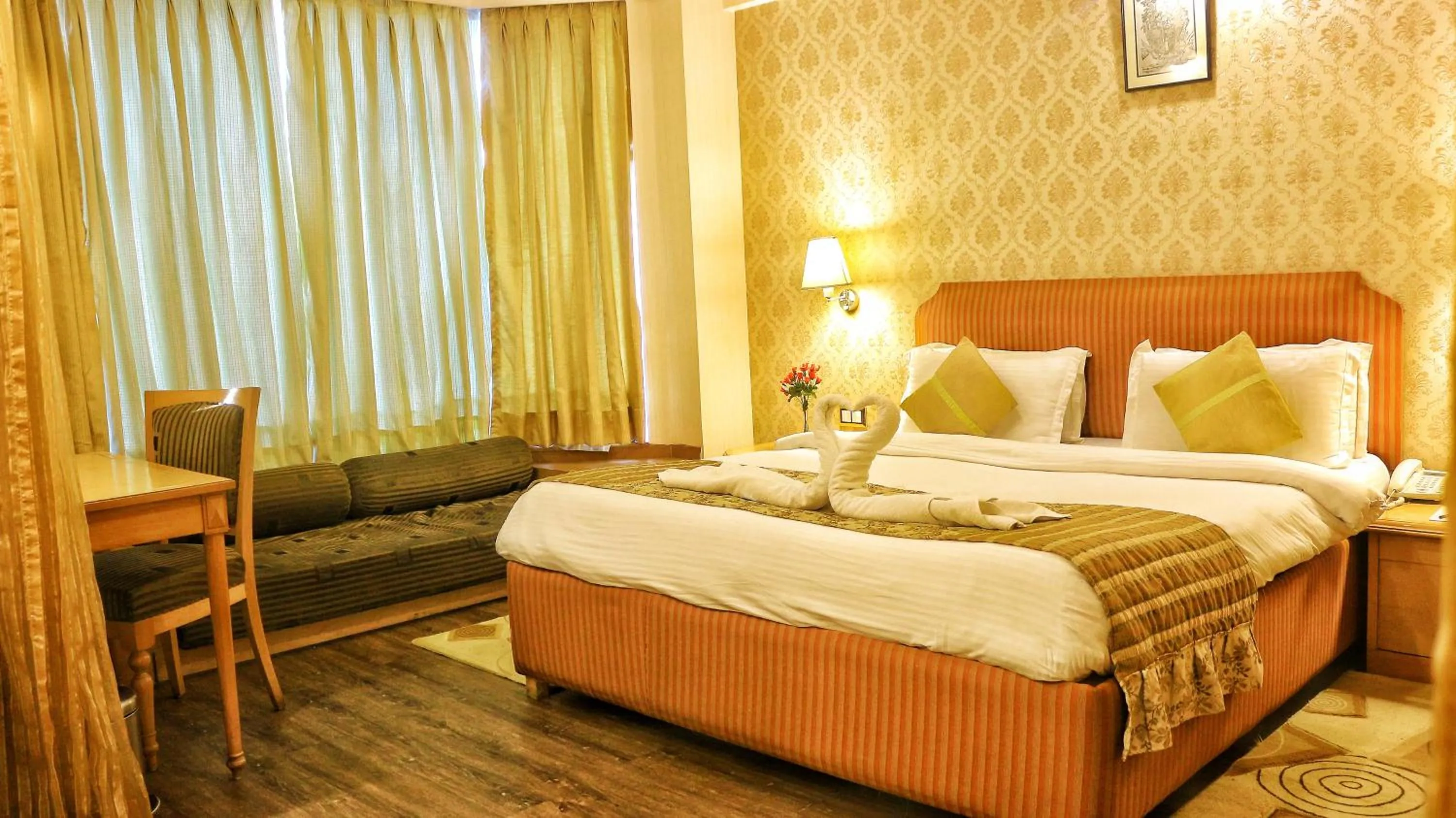 Bedroom in Dee Marks Airport Hotel & Resorts
