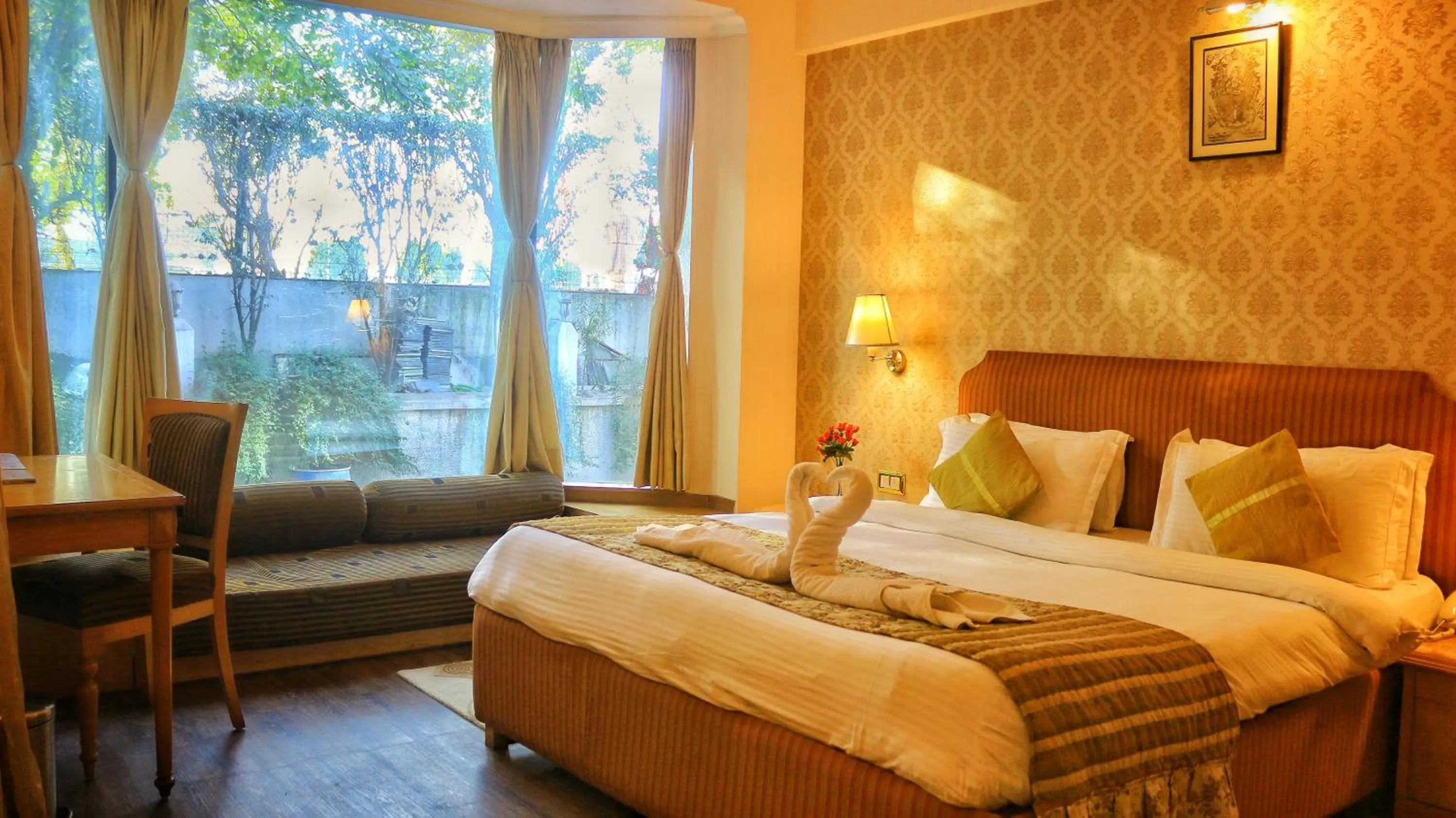 Bedroom in Dee Marks Airport Hotel & Resorts