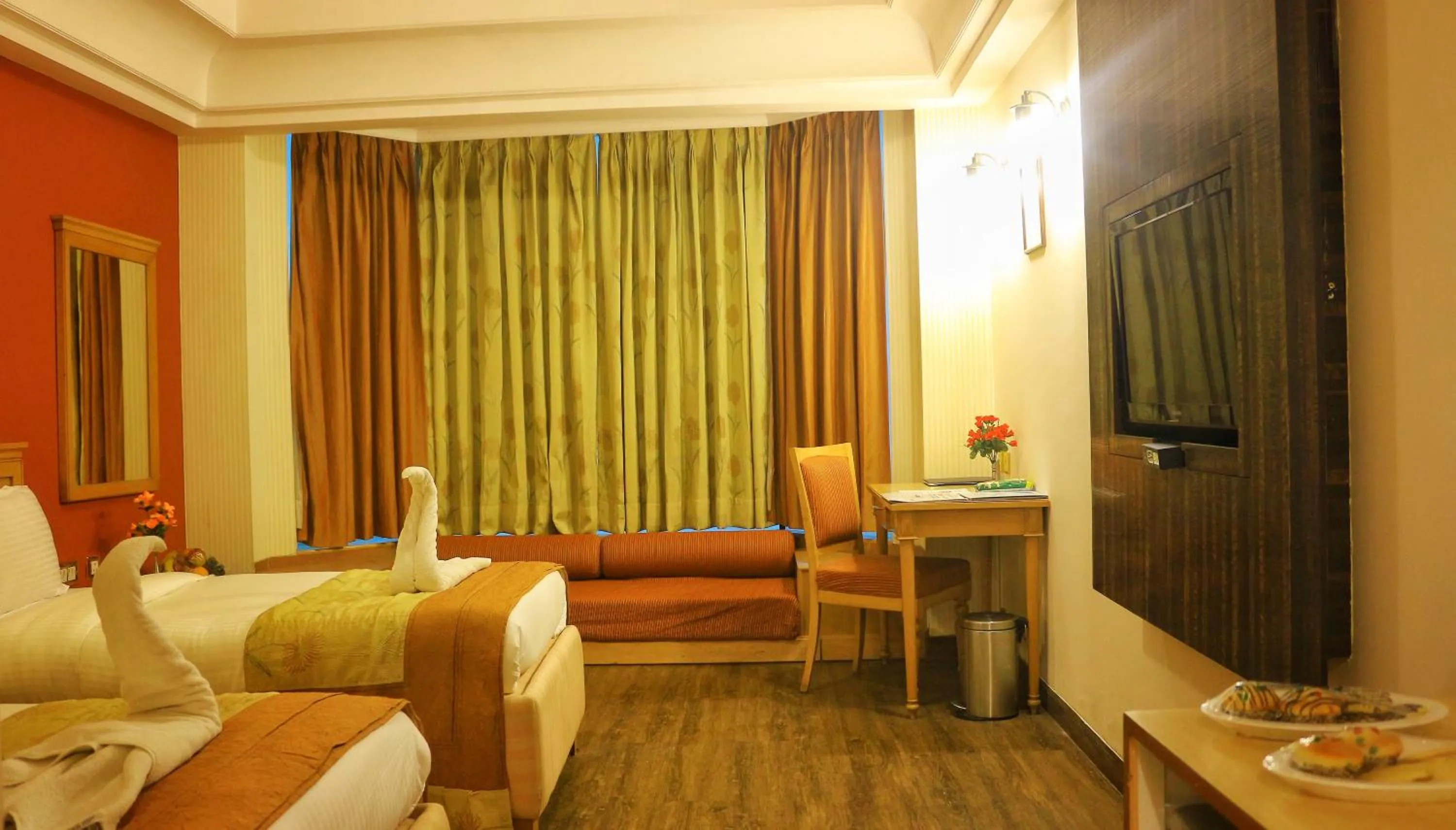 Bedroom in Dee Marks Airport Hotel & Resorts
