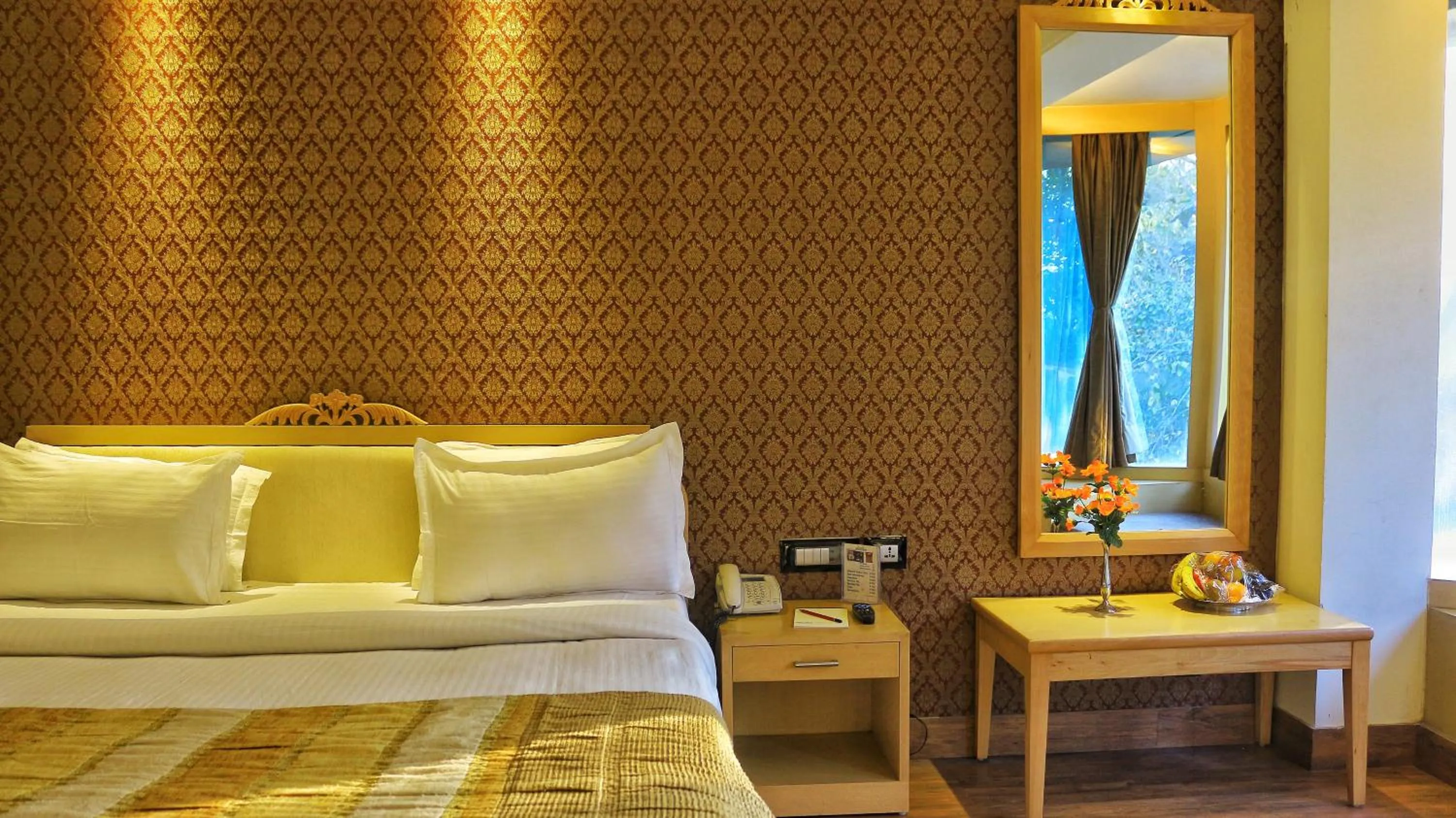 Bedroom in Dee Marks Airport Hotel & Resorts