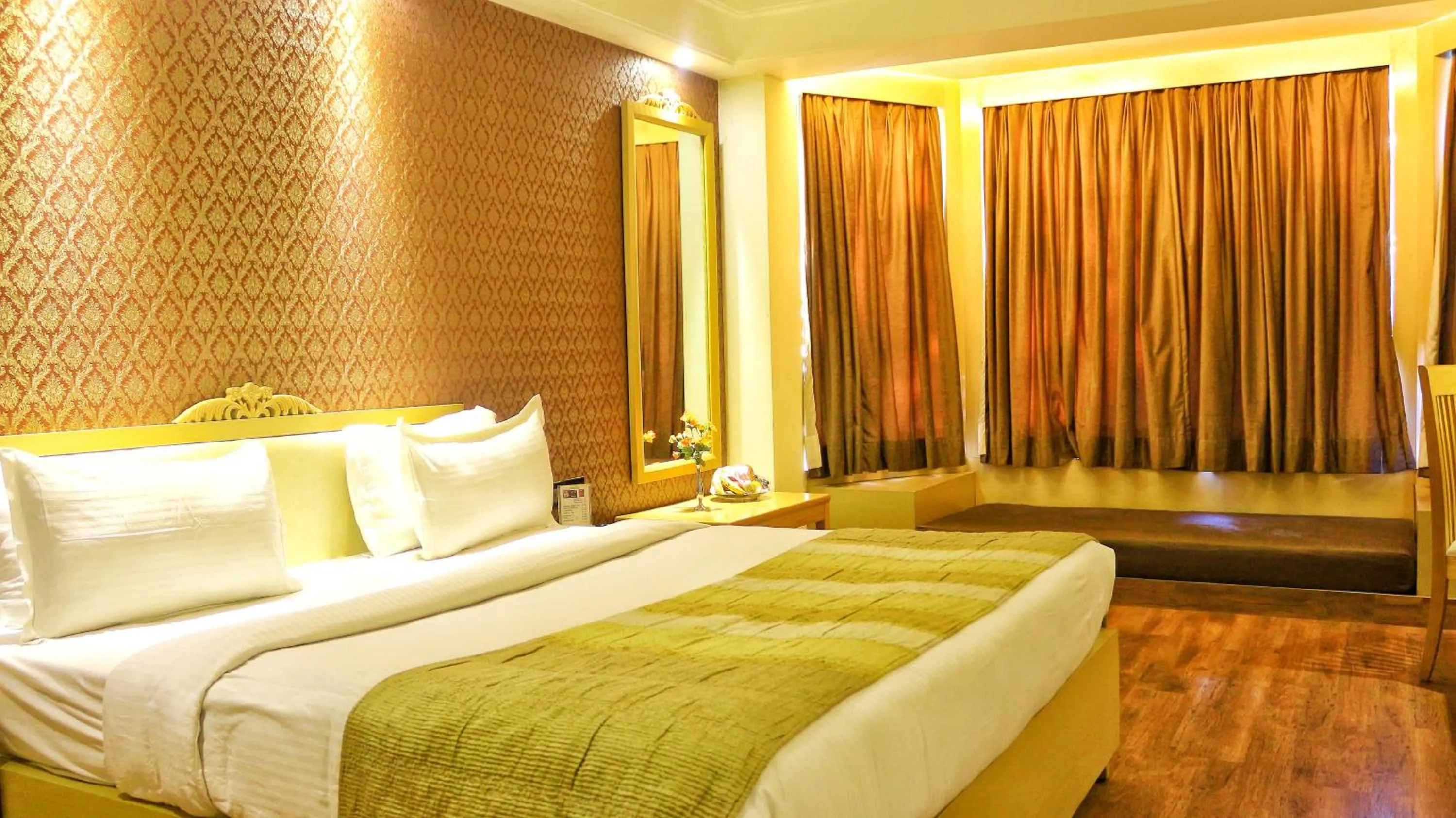Bedroom in Dee Marks Airport Hotel & Resorts