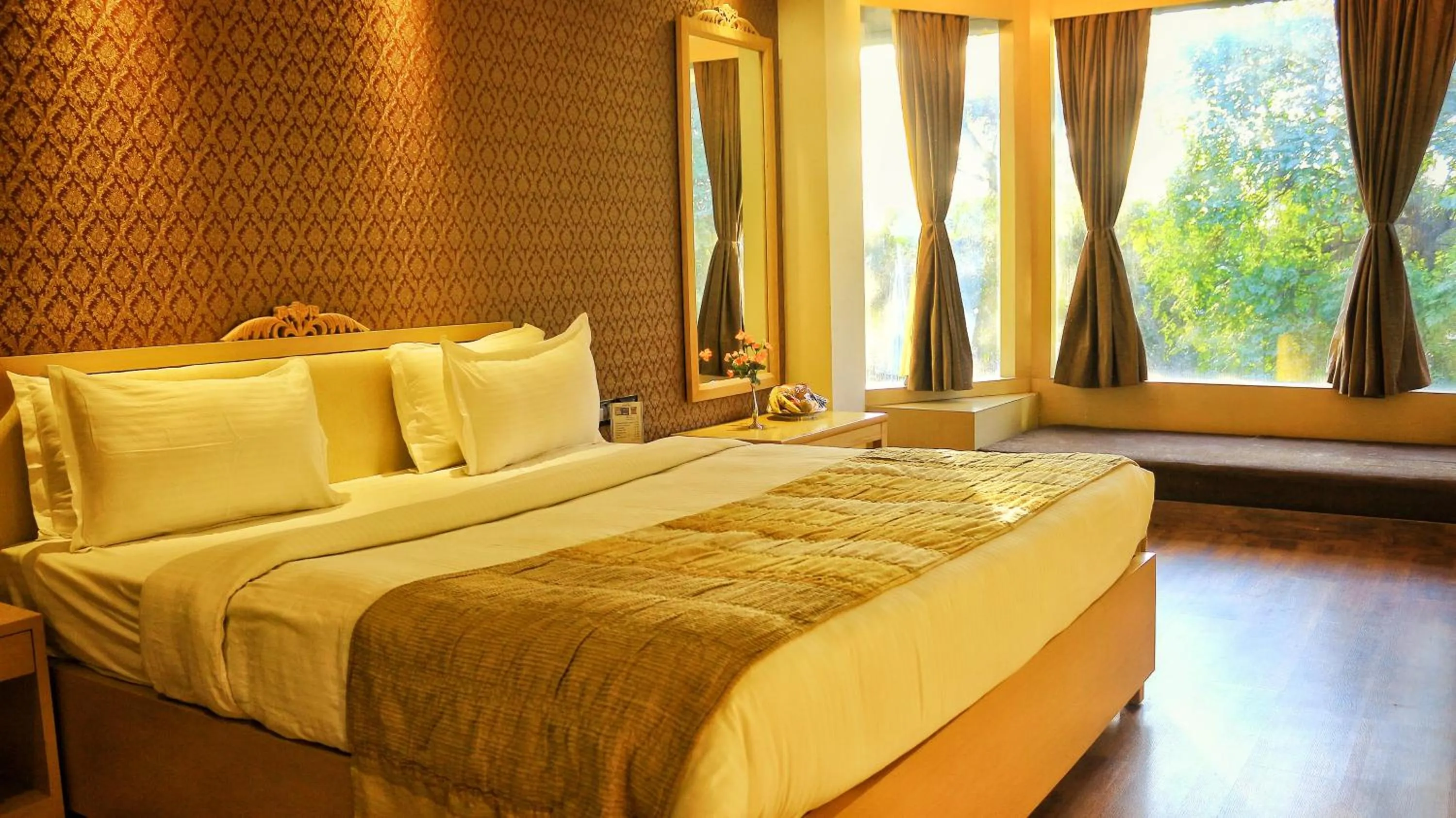 Bedroom in Dee Marks Airport Hotel & Resorts