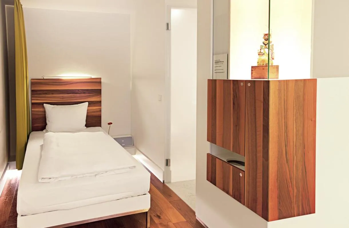 Bed in HOPPER Hotel St. Josef