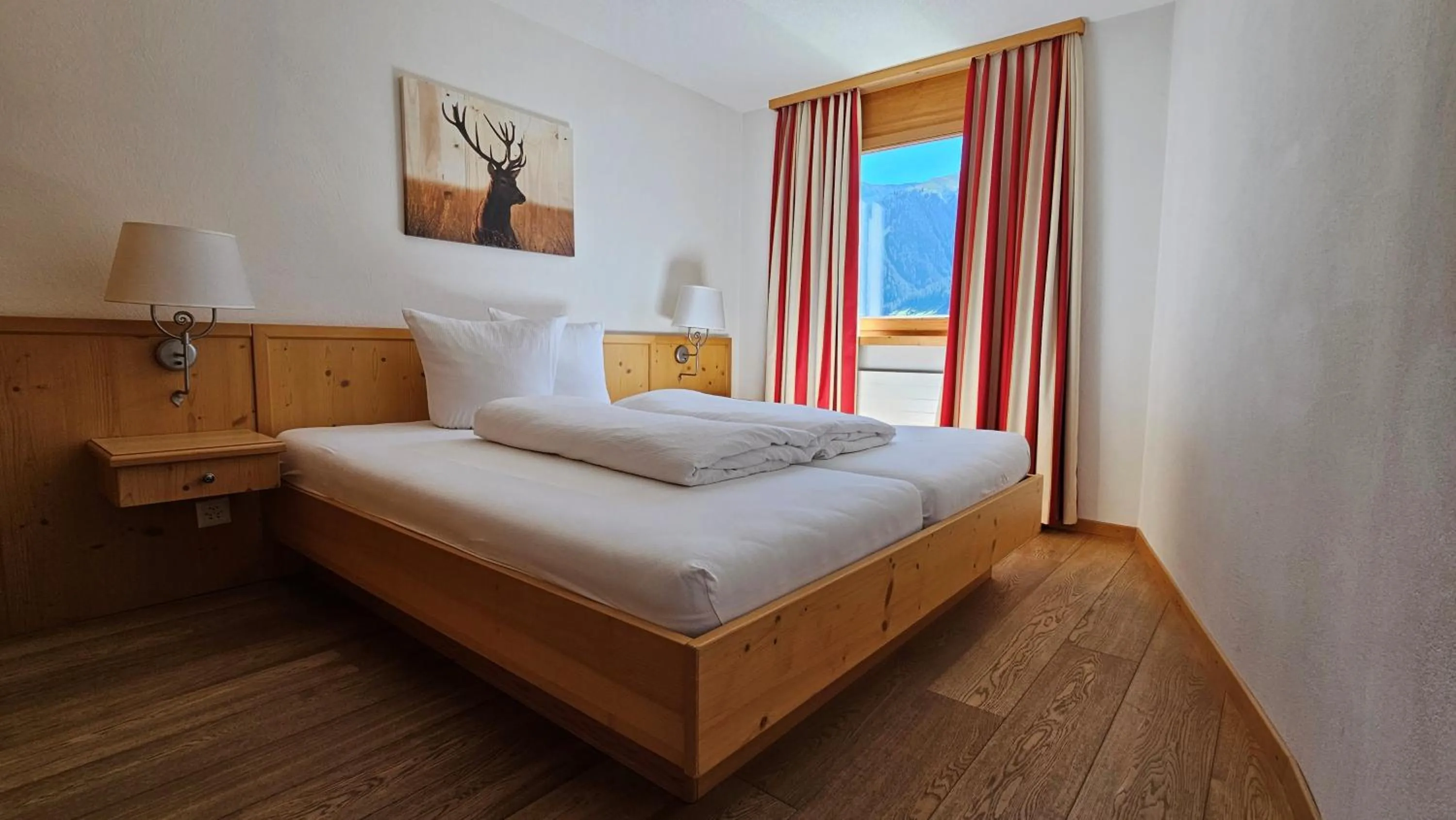 Bed in Aparthotel Muchetta