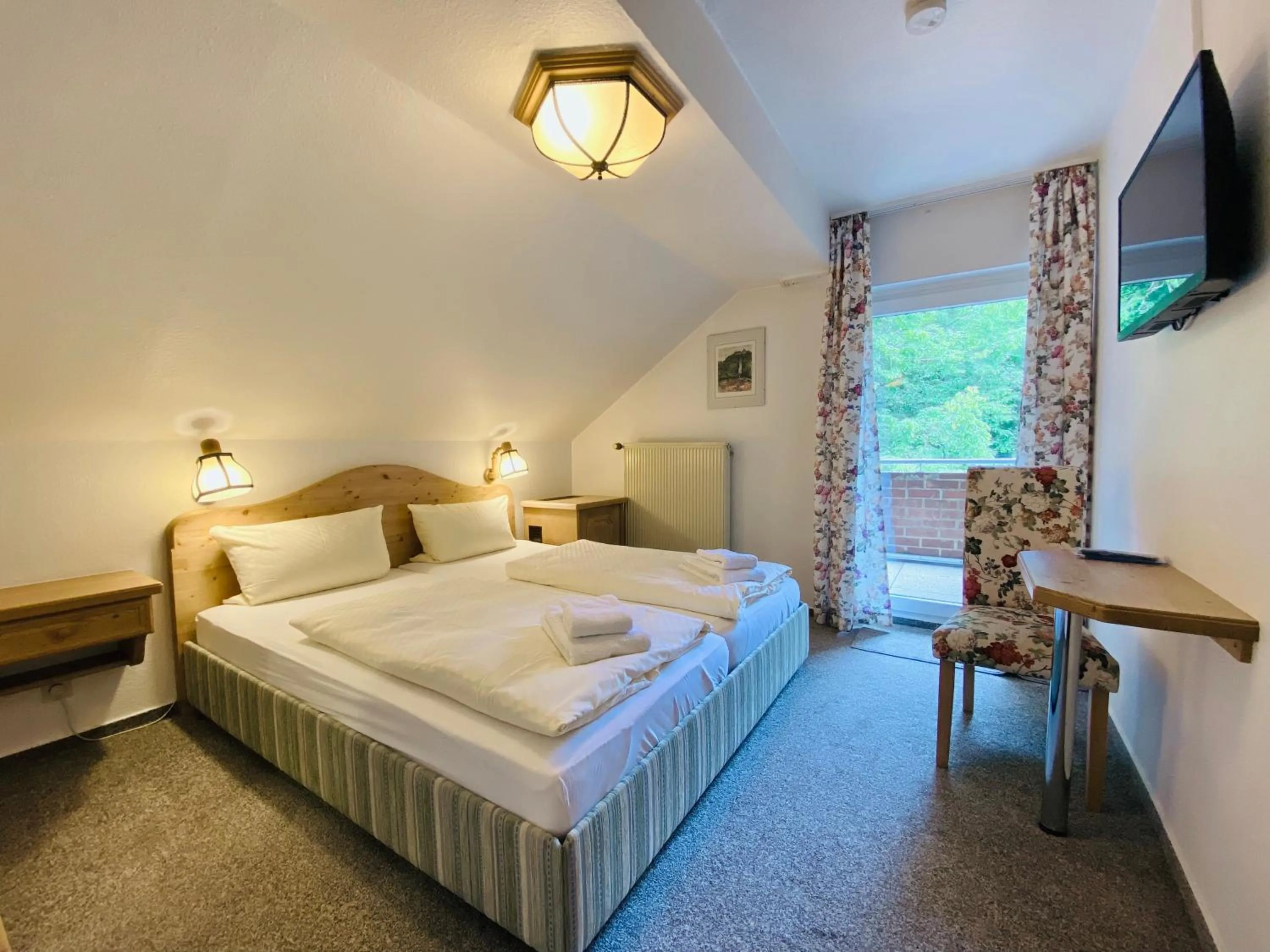 Photo of the whole room, Bed in Landhotel Edersee