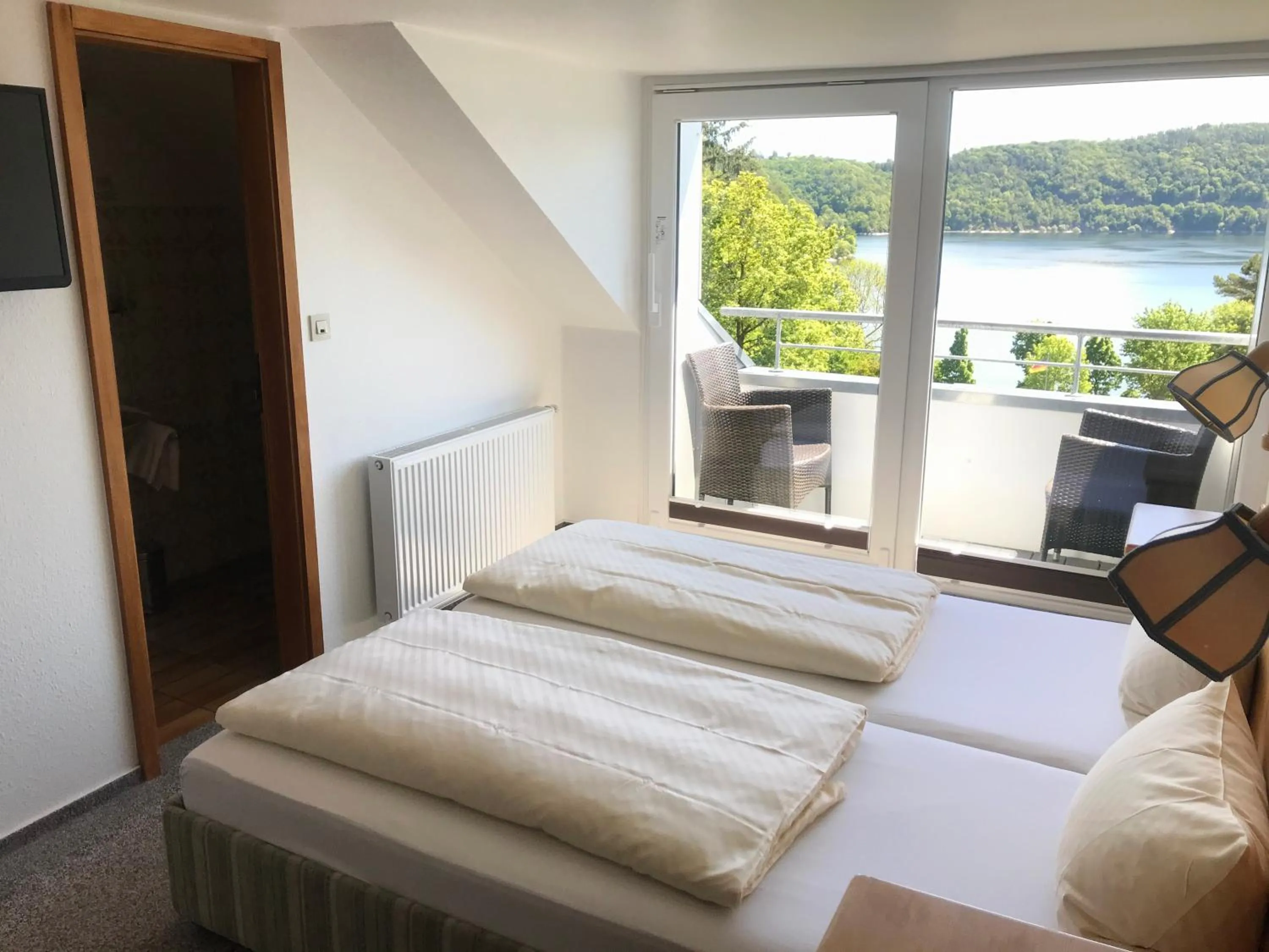 Photo of the whole room, Bed in Landhotel Edersee