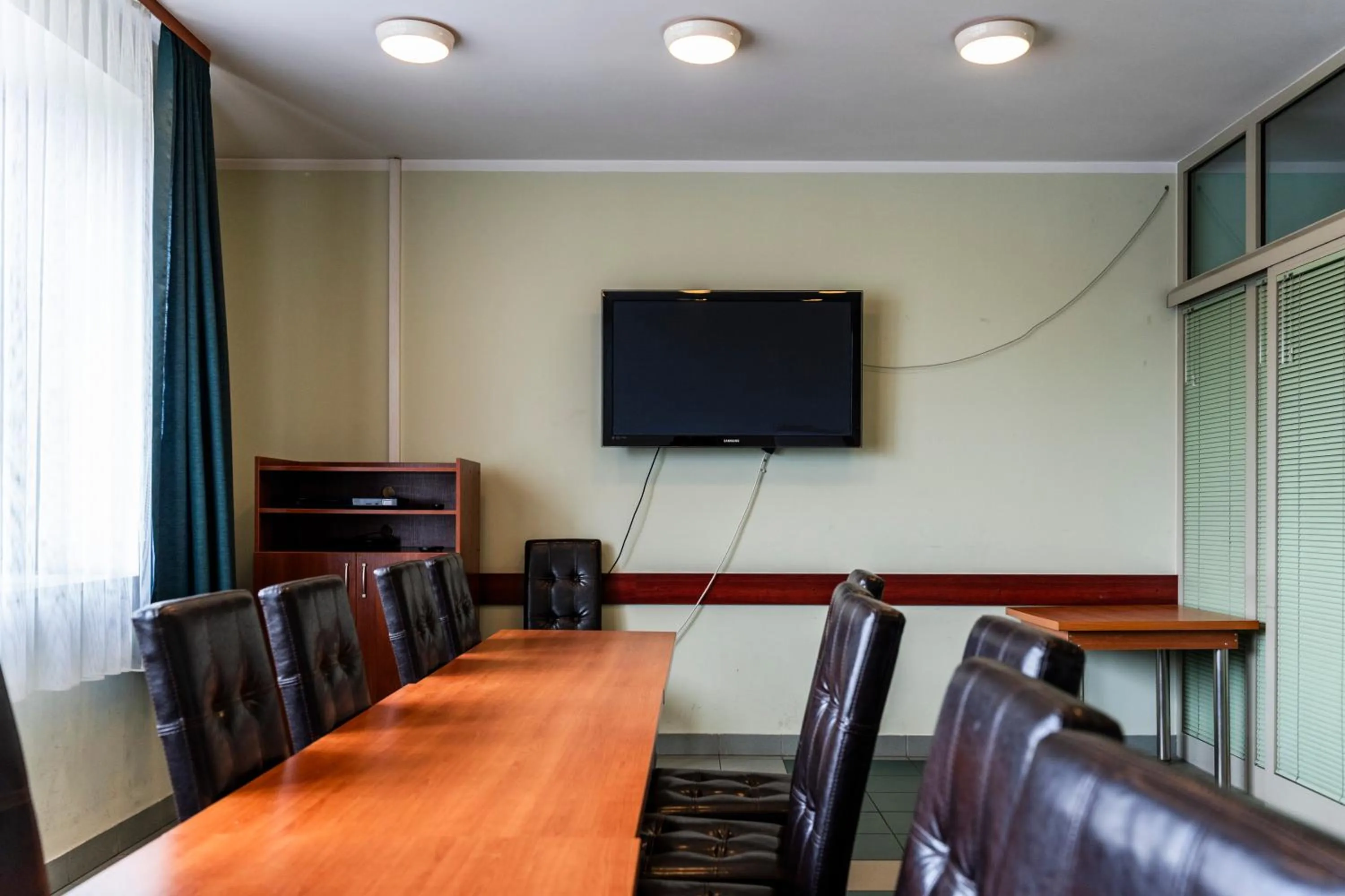 Communal lounge/ TV room in Dom Duszpasterski Sanktuarium Bożego Miłosierdzia