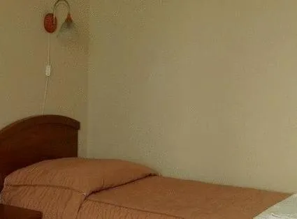 Bed in Pastoral Lodge at the Sanctuary of the Divine Mercy