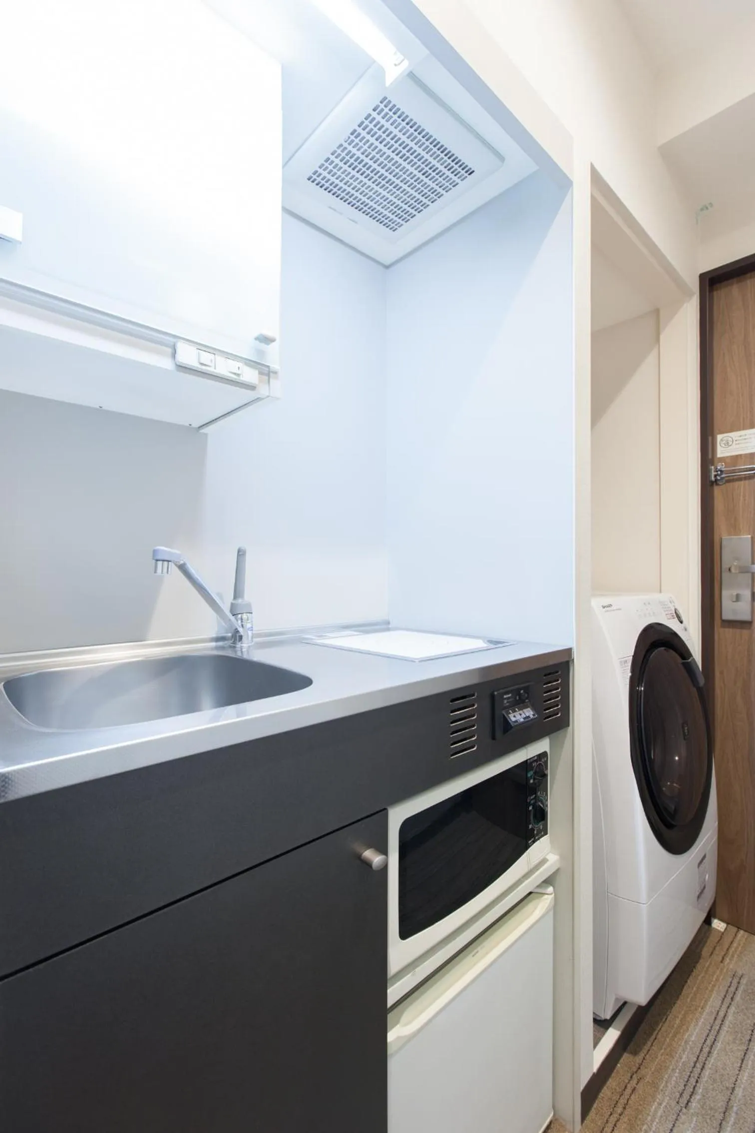 Kitchen or kitchenette in Tokyu Stay Yoga