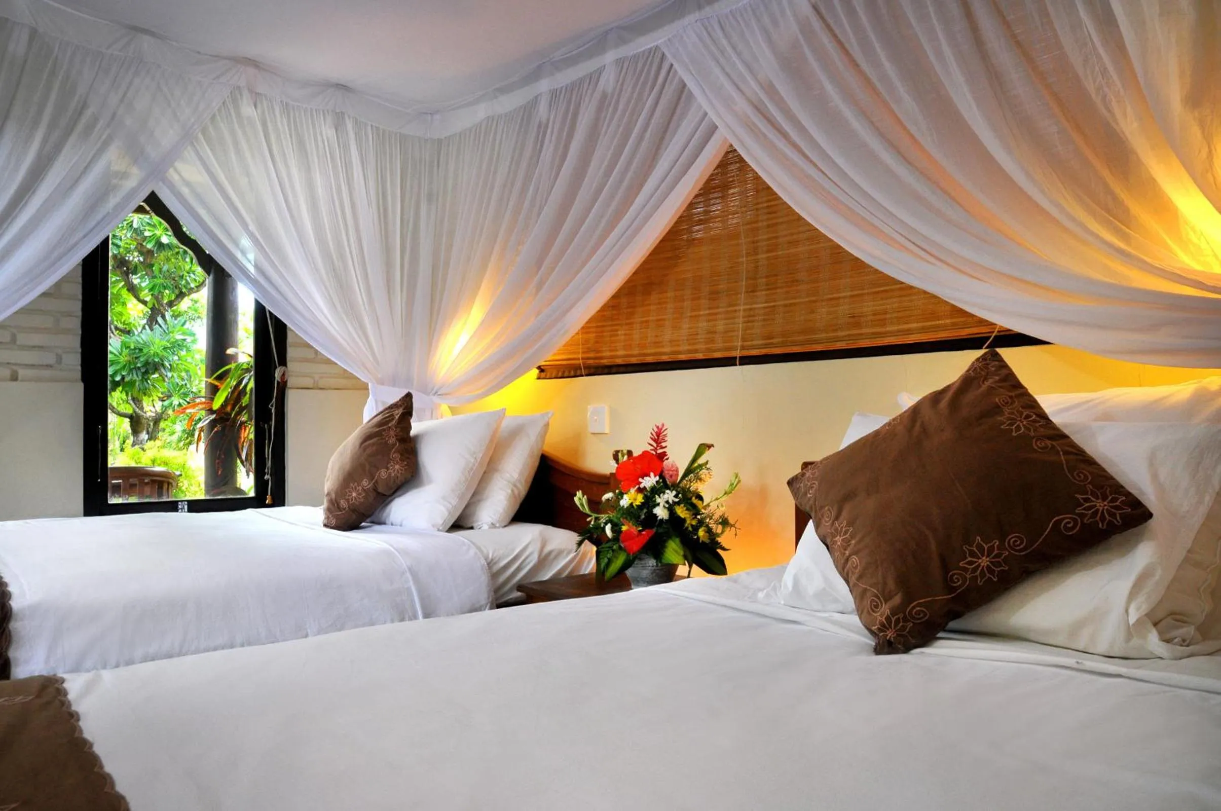 Bed in Hidden Paradise Cottages