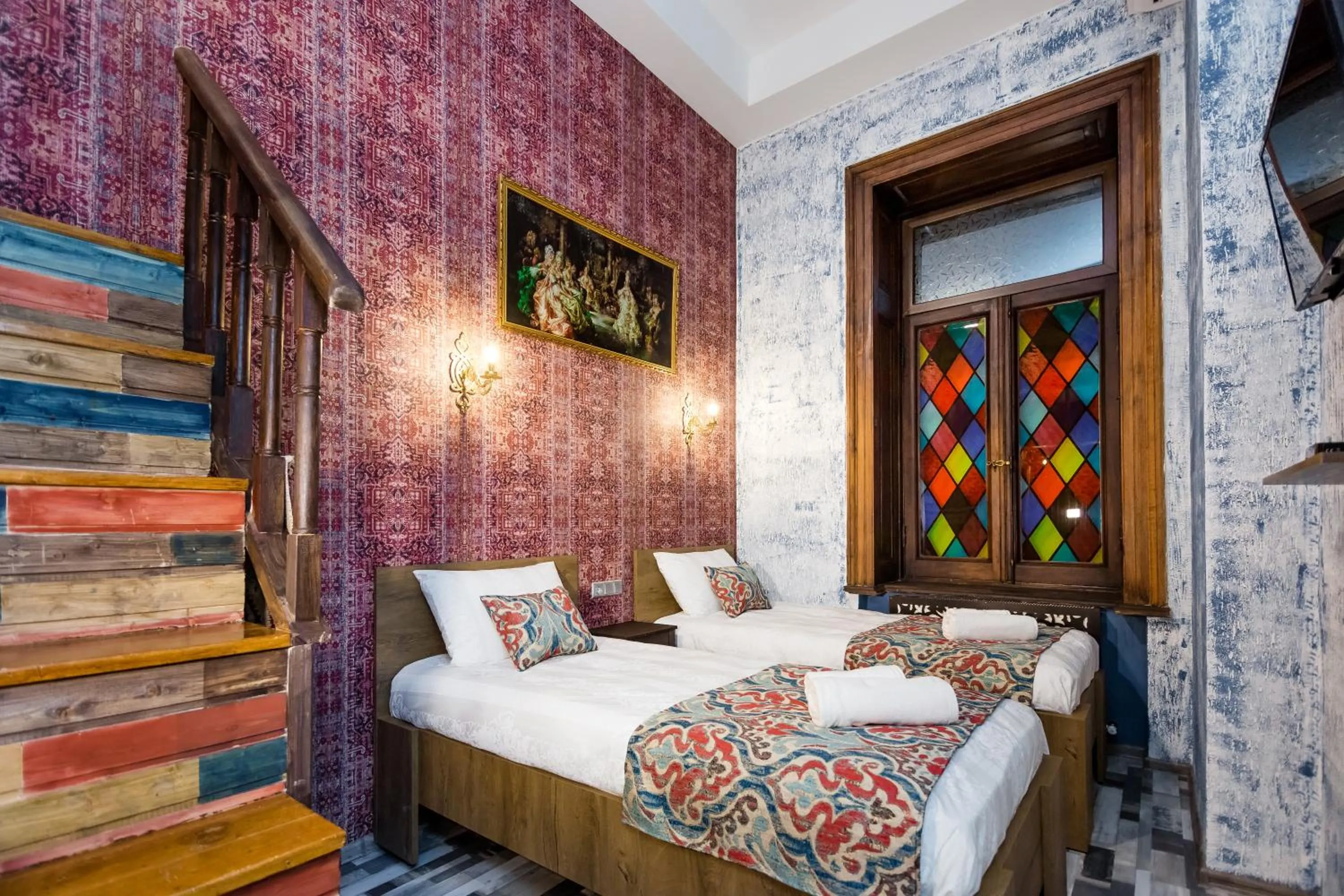 Bed in Tiflis Inn Boutique Hotel