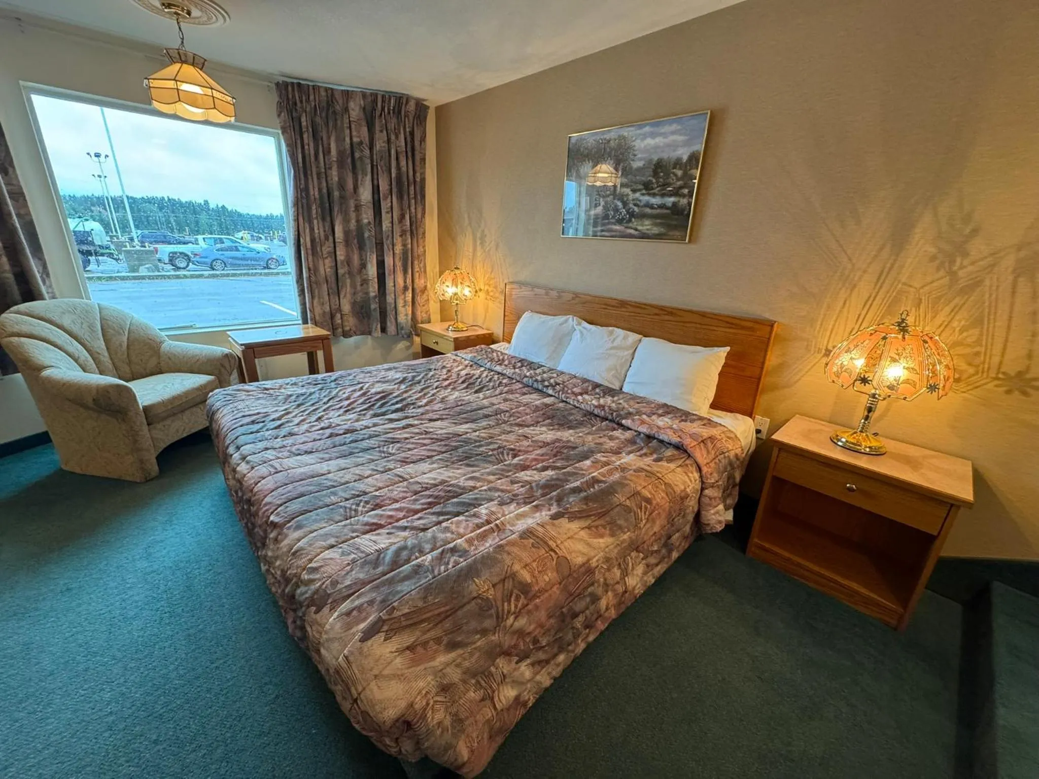 Bed in Western Budget Motel #3 Whitecourt