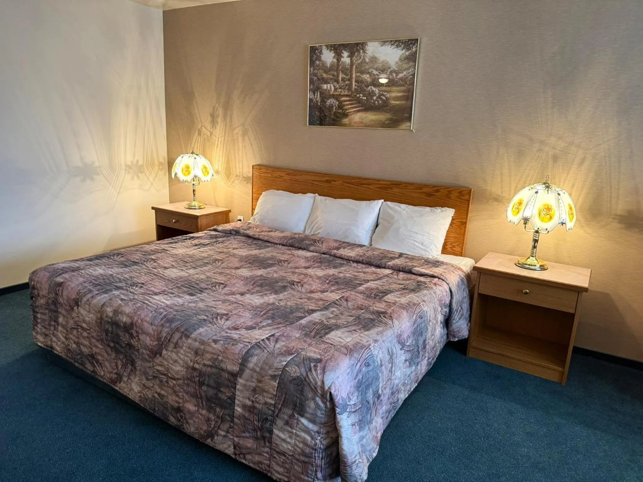 Bed in Western Budget Motel #3 Whitecourt